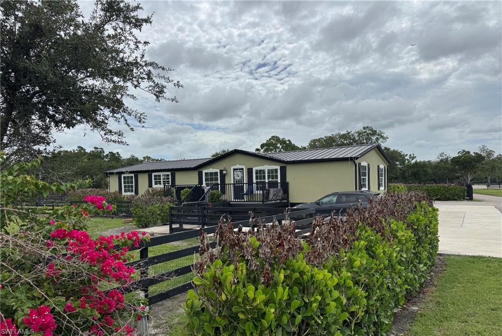 LOOKING for a professional equestrian facility planned and built to exact standards and with equestrian amenities in mind for effective use of space and function. 
Three homes fully remodeled and updated, 2 with in ground pools, on 20 acres+/- with custom built luxury 16 stall horse barn, outdoor riding arena with elevated observation areas, beautiful paddocks, grass turnout, large RV, boat, car storage building ready for events, features bathroom, entertaining areas and perfect for promotions and wedding venue, a separate quarantine barn with bathroom and tack room, paved driveways, fully professionally landscaped and fully gated. Plenty of room to build a custom luxury estate residence on property, while enjoying income from the other 3 homes.
Income producing, this facility is a great place to call your full-time residence, winter retreat or a Florida investment property. Inquire for figures and possibilities for this amazing location and equestrian facility in Alva, FL. Convenient to the Caloosahatchee River, boating, jet skiing, canoeing and kayaking are all your options here exploring Olde Florida from the water.
Route 80 West to Interstate 75 allows access to Fort Myers, Naples, and the SW Florida International Airport, or travel East to Ft Lauderdale and Miami too. Horse shows are plentiful in Venice, Sarasota, Tampa, Wellington, Ocala- WEC, HITS, and so many more accommodating all disciplines of riding. 
An upscale, 20-acre haven where riders and their equine partners could thrive. Owners have meticulously designed every aspect of Equestrian Acres, from the immaculate stables and lush pastures to the expertly maintained riding arena, to provide an environment that fosters growth and success for equestrians and their mounts. Property feature sheet is available along with a beautiful farm video, 100 photos and 3D tours.
Sale includes parcel numbers: 22-43-27-00-00002.0160, 22-43-27-00-00002.0170, 22-43-27-00-00002.002A, 22-43-27-00-00002.0020 
17701 Pronghorn St Alva FL, 17700 Pronghorn St Alva FL, 21531 N River Rd Alva FL, 21571 N River Rd Alva FL
Approximately 20 acres +/- being sold together only.