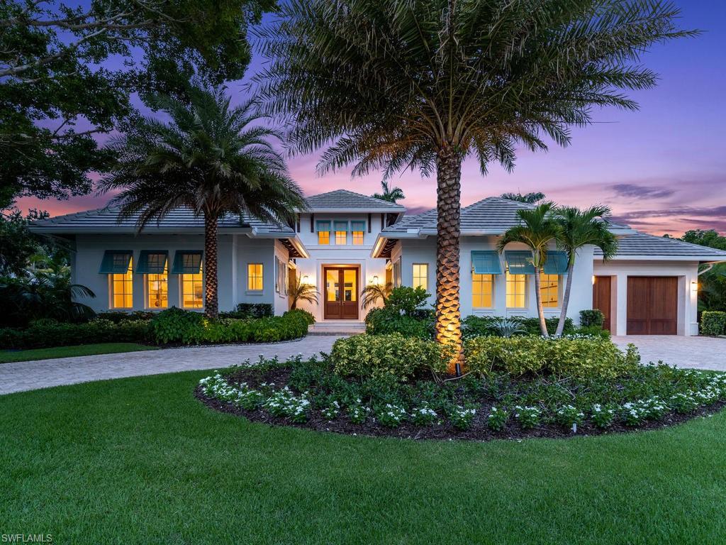 H.13582 - Tucked behind a beautiful Banyan tree, this newly constructed coastal retreat sits in the heart of the Moorings community.  Designed by the world-renowned John Cooney of Stofft Cooney Architects and perfectly executed by the SGM Building Group, this versatile single level floorplan offers: 5 bedrooms, a well-equipped summer kitchen, an outdoor living space with Sentinal electric screens and shutters, and an expansive poolside deck.  Large sliding glass doors open the home to the outdoor space, while the dedicated pool bath and cabana room allow for endless open-air enjoyment day or night.  The interior of the home is equally well-equipped with DuChateau oak floors, a gourmet chef's kitchen with Wolf-Sub Zero appliances, a formal dining area, Control 4 automation, his and hers master bathrooms, and a finished wine room.  With Venetian Village and the private Moorings Beach Park only seconds away, this home delivers pristine beaches, sub-tropic warmth, and an ultra-luxury coastal living experience.