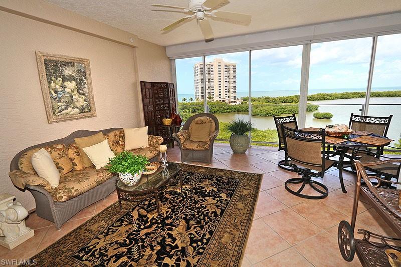Bargen on the Beach!!
This lovely Baypointe condo has outstanding views of Clam Bay and the sparkling Gulf of Mexico. A rarely found full three bedroom, three bath property with decor that reflects the owner's southern hospitality. Charming and comfortable with floral wallpapers, plantation shutters, pretty linens. Hardwood flooring in each bedrooms with area rugs. Enjoy dining on the large, well furnished  terrace overlooking Clam Bay and the Gulf. Guest bedrooms also enjoy a separate screened balcony with backwater views. 
This building features a large heated pool, spa, fitness room, billiards room, social room, guest suites and on-site manager. Walk to Waterside Shops and the Village on Venetian Bay shops and restaurants. Baypointe is a gated community. HOA requires a 90 day lease.