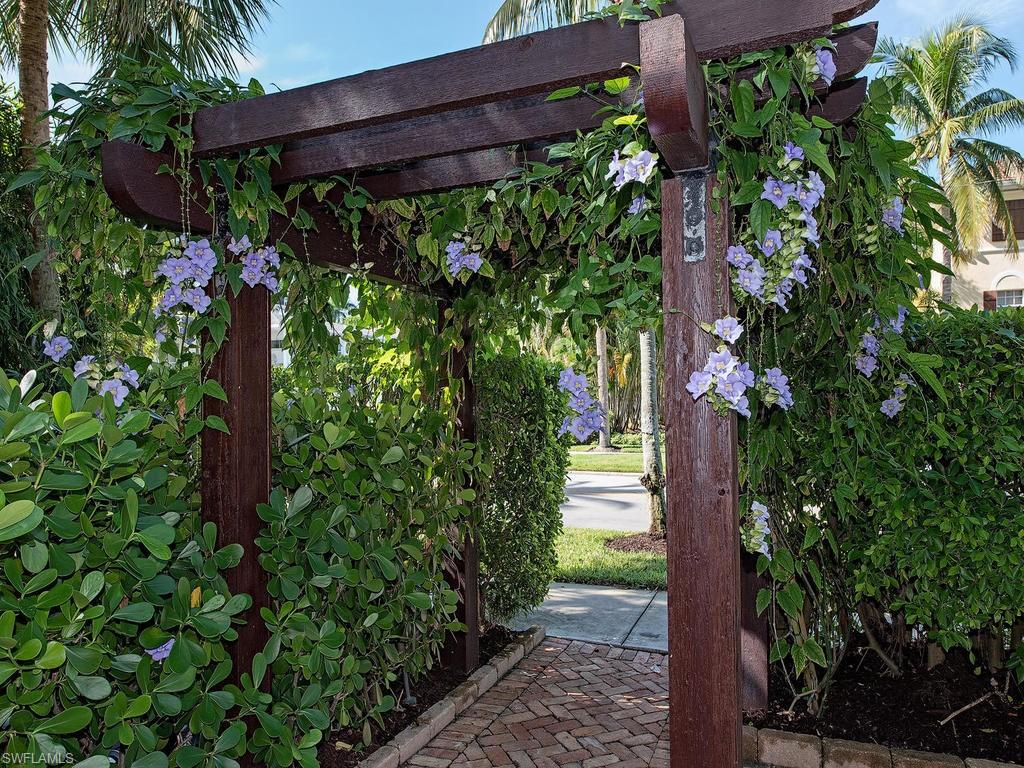 V.2765  Located in Old Naples and situated at the corner of Fifth Avenue South and Third Street South are 16 extraordinary private and secluded luxury residences called Villas Escalante. These homes are nestled in a botanical garden setting, adjacent to world-class shopping, dining, galleries, cultural amenities and the renowned sugar sand beaches and the Gulf of Mexico. Villas Escalante is the standard bearer for luxury villas in Old Naples; this residence is the jewel in its crown. This south-facing detached villa has no shared walls, is just a short 1 1/2 blocks to the beach, features a totally private outdoor space, is magnificently designed with the finest appointments, and is a must-see for the most discerning buyer.