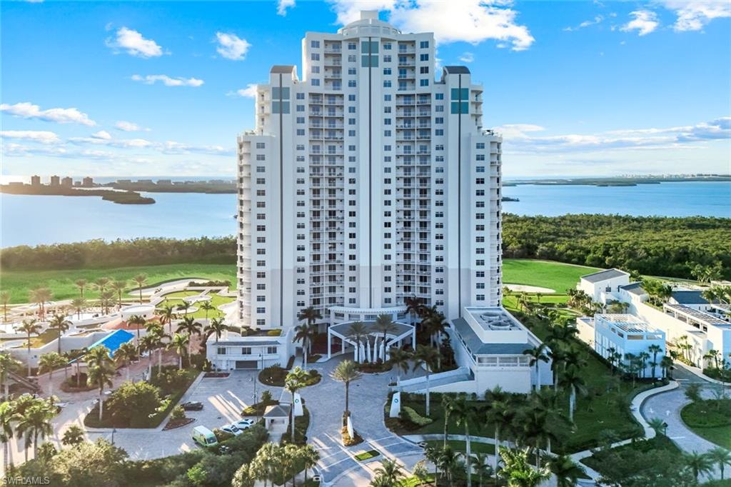This truly remarkable 4-bed + den, 4.5-bath Seaglass Penthouse with a private 2.5-car garage offers a bird’s-eye perspective of paradise. With panoramic views of the Gulf of Mexico and Estero Bay, every room was designed around the drama of the horizon, where endless sky meets shimmering water. Elegant coffered and tray ceilings with cove lighting elevate the open layout, while floor-to-ceiling glass immerses you in natural light and sweeping coastal vistas. A cozy fireplace, wet bar, and two open-air balconies set the stage for effortless entertaining and tranquil evenings aloft. The chef’s kitchen impresses with a 48" Sub-Zero refrigerator, Thermador gas cooktop, Bosch wall oven, dual wine coolers, and rich light wood flooring throughout. Smart-home features include a Lutron shading system, audio/visual network, and whole-home automation. Within Seaglass, enjoy concierge services, a private theater room, guest suites, and a resort-style pool and spa. Beyond, the Bonita Bay lifestyle unfolds an on-site marina with restaurant and boat storage, miles of walking and biking trails, kayak rentals, and a staff-attended private beach club on Bonita Beach just minutes away. Private Membership at The Club at Bonita Bay opens access to five championship golf courses by Arthur Hills and Tom Fazio, 18 tennis courts, pickleball, croquet, five restaurants, and a state-of-the-art Lifestyle Center and spa. Where sky, sea, and luxury converge, this penthouse stands as a sanctuary in the clouds, crafted for those who see beauty not just in the view, but in every detail that frames it.