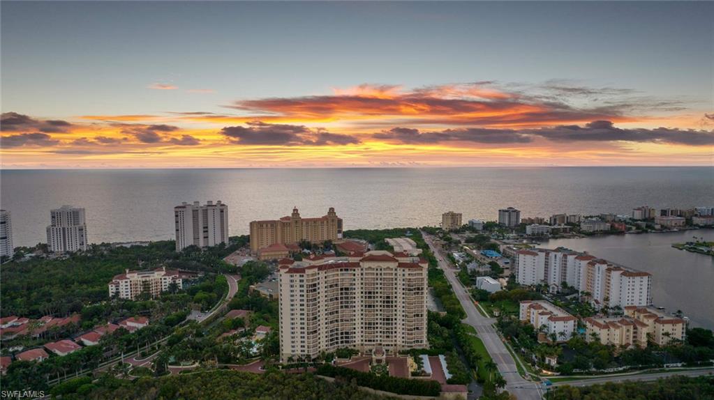 Highrise living combining elegance and exclusivity, the 20-story Trieste at Bay Colony in Pelican Bay features spacious residences with dramatic architectural floor plans. Unit 502 features an open floorplan flooded with natural light while the spacious screened terrace offers partial Gulf views and perfect positioning for spectacular sunsets. With a sophisticated interior, this residence features a bright, open floor plan, elegant tile flooring, premier custom cabinetry, granite countertops, built-in appliances, and sophisticated lighting. Trieste is currently undergoing a complete, luxurious update to the buildings common areas which includes amenities such as social room, library, movie theater, billiards, state-of-the-art fitness center, heated pool and spa, pool pavilion, 24-hour guarded front desk and more. Just steps to the white sand beaches of Naples and a variety of exclusive amenities, including the newly remodeled and private Bay Colony Beach Club, with Gulf-front dining, tennis, and a pool. Bay Colony residents also enjoy Pelican Bay privileges.