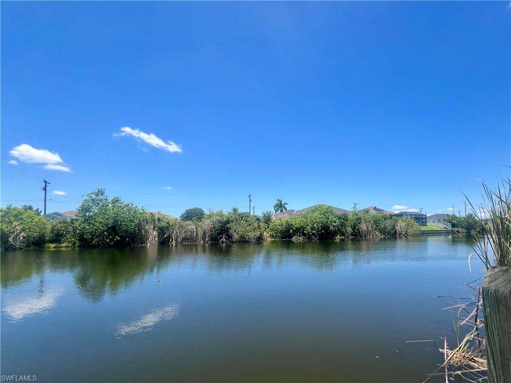 Fantastic opportunity! This lot is located in the beautiful community of Cape Coral with canal access and large canal view. New construction homes nearby. Perfect for building your dream home in a serene environment. With easy water access, It is ideal for boating enthusiasts and outdoor activities. Don't miss out on being part of this Community.