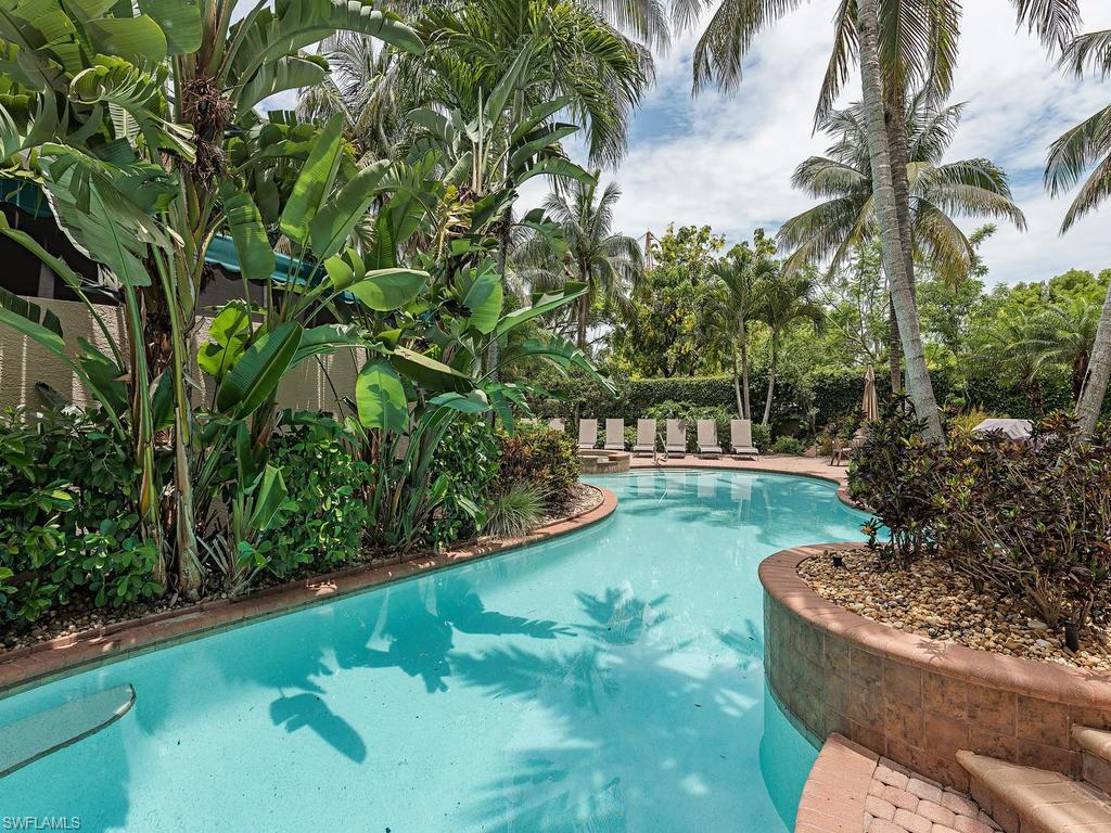 C.13740 Highly sought-after 1st floor unit in the lushly landscaped tropical oasis of Lantana. Ideally situated just 1 block from the famed shopping and dining district of 5th Avenue S., this private, gated, pet-friendly enclave of only 17 residences boasts 2 crytal-blue resort style pools and 2 heated spas.  Enjoy the outdoors from your covered, screened lanai that brings the outdoors in or relax in your open great room. You’ll appreciate the new stainless steel appliances and granite countertops as you entertain your guests in the roomy, comfortable kitchen. The enclosed den is currently being used as a 3rd bedroom and is situated next to the 3rd full bathroom. There is plenty of storage space between your walk-in closet and private, attached 2-car garage.