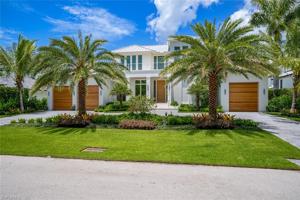 This beautiful Coastal Contemporary waterfront home invites you to the Aqualane Shores neighborhood of Old Naples. This Stofft Cooney design built by Source Construction offers direct waterfront access on Bittern Channel with bay views from the second level. With over 7500 total square feet of living space, this homes open floor plan offers incredible indoor / outdoor living spaces as well as 4 bedroom, 4 full and 2 half baths. In addition to the 2000 square feet of outdoor living space, this home has a great room, office/media room and second floor lounge/media space. The outdoor area living spaces offer everything needed for complete outdoor Florida living. This property offers one of the best direct gulf access boating neighborhoods, a close walk to access all of third streets neighborhood shops and restaurants, as well as our beautiful white sand beaches and the Gulf of Mexico.