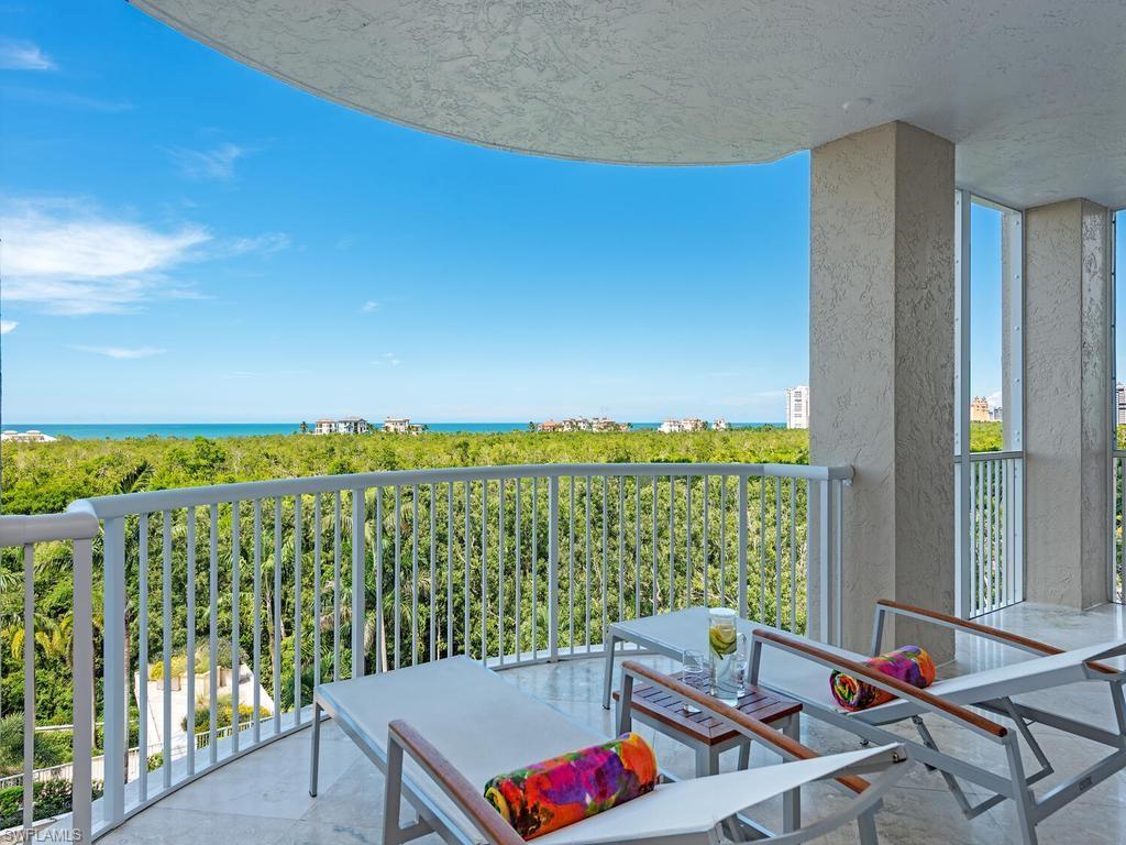 Vibrant Coastal Allure: Unit 507's Forever Panoramic GULF Vistas. This contemporary Three-Bedroom, Three-Bath Residence maximizes sweeping panoramic GULF and Sunset Views, as St. Raphael’s architectural tower design elevates the home’s Fifth-Floor vantage to rival a typical SIXTH-Floor GULF perspective. Overlooking Pelican Bay’s protected sanctuary, you’ll enjoy Sunsets that never grow old and a lasting connection to nature. Floor-to-ceiling glass walls create a sense of openness, seamlessly blending indoor elegance with outdoor tranquility. Natural Stone Flooring flows throughout, complemented by 9-Foot Ceilings and a generous floor plan designed to maximize privacy for both Owners and Guests. The GULF-Front Owner’s Suite is a serene retreat with a spa-like bath. The Primary Guest Bedroom offers expansive GULF-Front views and a chic en-suite bath. The Third Guest Room serves as a versatile space, perfect as a Bedroom, Office, or Den, with an adjacent full bath. This residence includes TWO Under-Building Deeded Secured PARKING SPACES for enhanced peace of mind. Structural Integrity Reserve Study (SIRS) and Milestone Reports complete. Renowned for its amenities and coveted “on the berm” Pelican Bay location, St. Raphael offers easy access by foot, bike, or Golf Cart Tram to miles of Sugar-White Sand Beaches just beyond your door. Residents enjoy 24/7 Security, Front Desk Service, heated Saltwater Resort-Style Pool and Spa, Two Har-Tru Tennis Courts, Fitness Center, Social Gathering Spaces, four Guest Suites and is pet-friendly. All of this is complemented by Pelican Bay’s Private Membership-Included Amenities: 2.5 miles of Pristine White Sandy Beach, Two Members-Only GULF-Front Restaurants and Sports Bars, Attended Beachfront Services, State-of-the-Art Fitness and Community Center, Two active Tennis Centers with 18 Har-Tru Tennis Courts, Pickleball Complex, and miles of scenic walking and biking paths. Your new Naples lifestyle places you at the heart of coastal luxury, steps away from Naples' GULF-Front Ritz Carlton, Artis Naples Performing Center for the Arts, Waterside Shops, Mercato, and Whole Foods all perfectly located with you in mind.