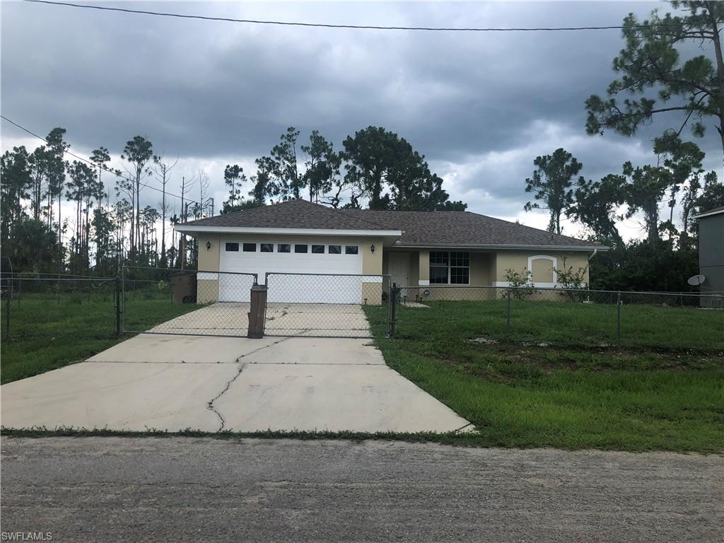 Freshly painted 3 bedroom 2 bath home with easy access to S.R. 82. Open floor plan with volume ceiling and lots of natural light. Beautiful quartz kitchen counters. Spacious walk in closets in all three bedrooms with his and hers walk-in closets in the master bedroom. Roof was replaced in 2018 and air conditioner unit was replaced in 2019 with a 10 year warranty. ADT alarm system installed and ready for connection. Large yard area with two good size sheds, bigger shed is air conditioned. Lot entirely fenced in. Come see this property today and make this your home!!