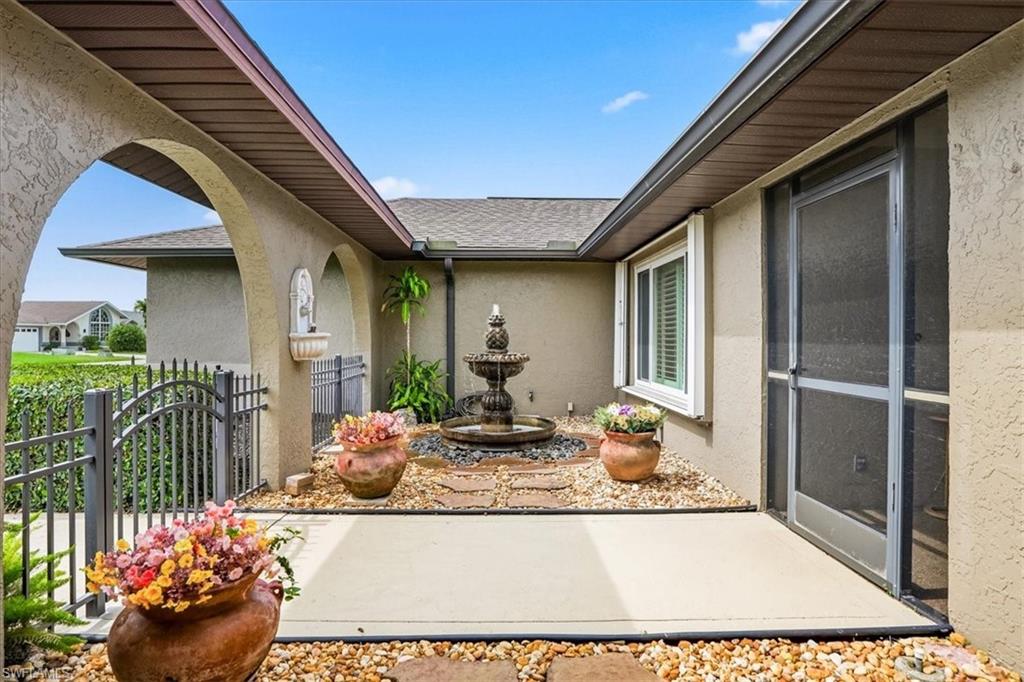 Exceptional Bonita Springs location, no HOA fees, and tucked away on a quiet cul-de-sac, this is more than just a house, it's a place you'll truly feel at home. From the moment you arrive, the setting is peaceful and inviting, with beautifully maintained landscaping, charming sitting areas, and the soothing sound of a fountain welcoming you to the front entrance.  Inside, the spacious layout offers formal living and dining areas, while large windows and sliding glass doors draw your attention straight through to the expansive lanai, sparkling pool, and tranquil lake views beyond. The kitchen is designed for both everyday living and entertaining, featuring abundant cabinet and counter space along with a sunny breakfast nook overlooking the pool and Southwest Florida's natural beauty.  The split-bedroom floor plan provides privacy, with a generously sized primary suite and en-suite bath serving as a relaxing retreat. A large laundry room offers exceptional storage space rarely found in homes of this size.  Step outside to the covered and screened lanai, where indoor and outdoor living blend seamlessly. Whether you're enjoying a sunny afternoon by the pool or relaxing during a Florida rain shower, this space is designed to be enjoyed year-round. The pool and lake views create the perfect backdrop for entertaining or simply unwinding at home. Come see today for yourself!