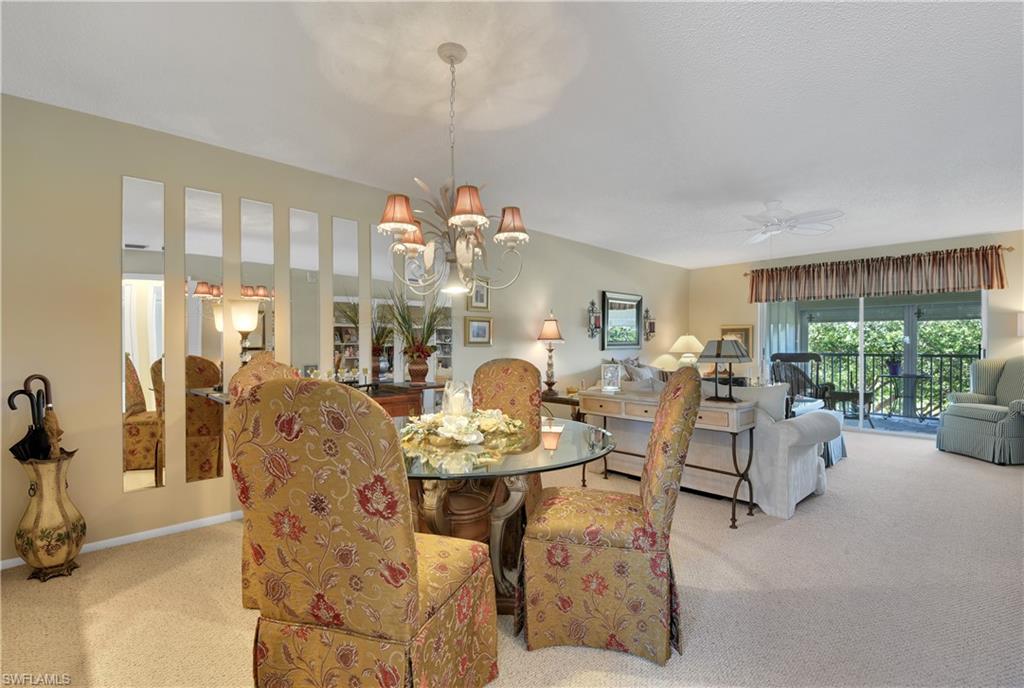 Wonderful condo w/ peaceful & serene setting! This home is ideal for SEASONAL or ANNUAL SWFL living and is being offered partially furnished. Featuring a comfortable floor plan, great room design, kitchen w/ lots of cabinets & countertop space, tile flooring in the main living area, updated baths, laundry closet w/ shelving off of lanai, and a screened lanai overlooking a lake & golf course. Meticulously cared for & gently lived in, plus there is a manual shutter on lanai for storm protection. Situated in a non-gated deeded condo community that offers a community pool, poolside community room w/ kitchen, new elevators, assigned covered parking, and ample guest parking spots. This area of Naples has easy access to I-75, only 15 miles from Marco Island, and just 16 minutes from the world famous shopping & dining of Naples 5th Ave.