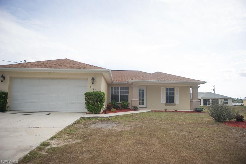 Beautiful Pool home in Lehigh Acres. Close to shopping and restaurants on a quiet street. New Carpet. New interior paint. Hardwood cabinets and solid counter tops with built in sinks in Kitchen and Bathrooms.