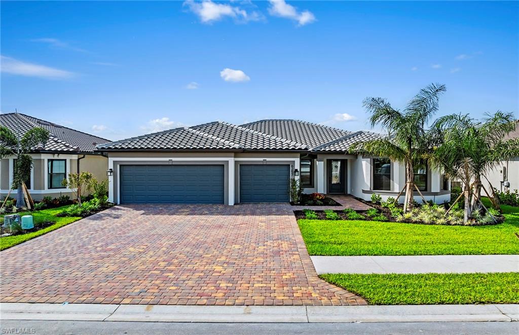 Move into this lovely Stellar now! This home has Enclosed Flex Room, Pool Bath, Large Walk-In Shower at Owner's Bath, Built-In Gourmet Kitchen, Zero Corner Pocket Sliders in Gathering Room, Porcelain Tile Throughout and Garage Epoxy Floor.