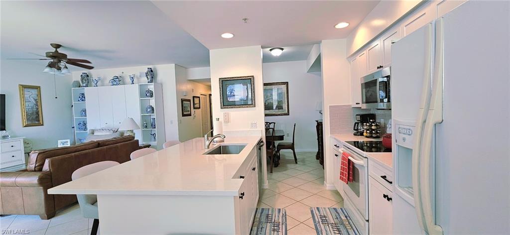 Beautifully updated with a fantastic view. This fully furnished 2 bedroom, 2 bath second floor condo features a brand new kitchen and updated bathrooms with new tile, vanities, toilets and lighting. Tiled throughout the living areas and new carpeting in the bedrooms this freshly painted, remodeled condo is ready to move into. Basic cable TV and internet included along with water, sewer and trash removal. Tenant pays electric. Heritage Pointe is a gated community featuring a clubhouse with community swimming poo & spa, fitness center, bocce and community room.
covered parking included.