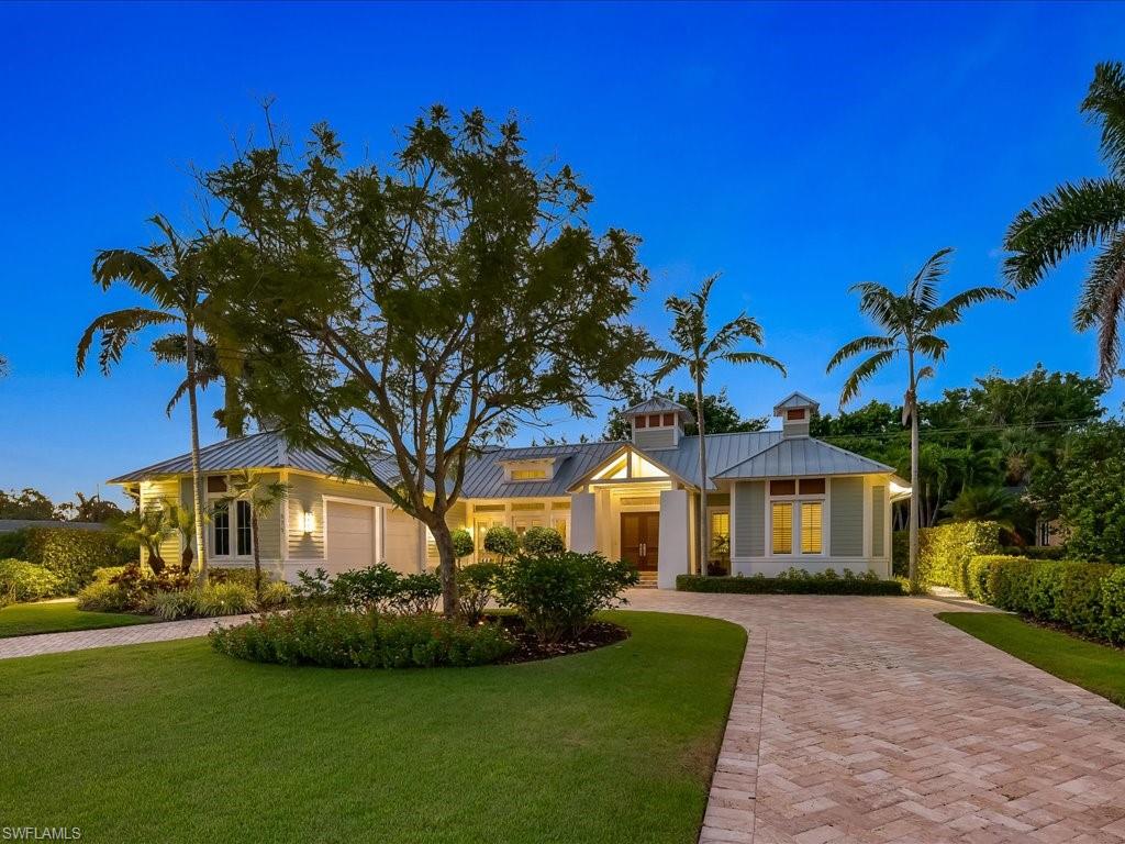 Nestled in the esteemed Coquina Sands neighborhood, 575 Orchid Dr stands as a testament to impeccable craftsmanship and design. This exquisite property boasts over 3,000 square feet of living space, offering open concept living areas, ideal for both relaxation and entertaining, 4 spacious bedrooms and 4 pristine bathrooms, each exuding meticulous attention to detail. The coastal-inspired construction of this residence harmoniously blends with its decor, delivering an ambiance that is both sophisticated and relaxed. Every inch of this home has been curated to perfection, echoing the serenity and elegance of Naples. Wide, sunlit spaces, high-end finishes, and thoughtful design elements create an unparalleled living experience. Just a stone's throw away from the beautiful beaches of Naples, inviting residents to bask in the sun, take invigorating strolls, or indulge in captivating sunset views. Whether you're a beach lover or someone who appreciates the tranquility of upscale coastal living, this home situates you perfectly to enjoy the best of both worlds. Experience the pinnacle of coastal living at 575 Orchid Dr, where every detail has been attended to with passion and precision.