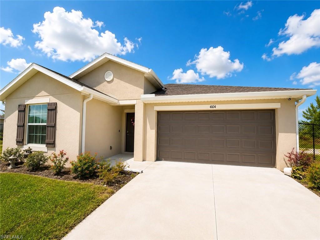 One or more photo(s) has been virtually staged, AI generated or rendered.  Motivated Seller!  Stunning, practically brand-new freshwater canal-front home built in 2025! This beautiful 4-bedroom, 2-bathroom residence offers nearly 2,000 sq. ft. of pristine, open-concept living space. The spacious interior features a bright living area, a dedicated dining space, and a modern kitchen perfect for entertaining. The split-bedroom floor plan ensures privacy, highlighted by a generous primary suite with an ensuite bath. Ideally located for families, this property is just a short 5 to 7-minute drive from local schools, including Diplomat Elementary, Diplomat Middle, and Island Coast High School. Step outside to enjoy peaceful freshwater canal views and the Southwest Florida lifestyle from your backyard. Complete with a 2-car garage and situated in a growing, highly desirable area of Northeast Cape Coral. Don't miss this incredible move-in-ready opportunity!
