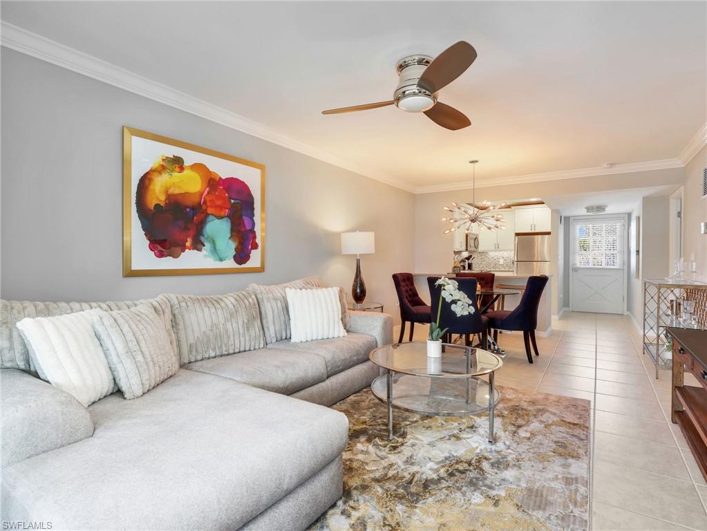 Move right into this beautifully updated 2 bedroom, 2 bathroom condominium in the highly desirable Moorings neighborhood of Naples. Thoughtfully renovated with a bright, light filled interior, this residence offers stylish finishes, a functional layout, and an exceptional location just moments from the Gulf of Mexico.

The updated, open, kitchen features white cabinetry, quartz countertops, a striking tile backsplash, and plenty of workspace for everyday living. Tile flooring throughout the main living areas provides easy maintenance, while carpet in both bedrooms adds warmth and comfort. Both bathrooms have been tastefully remodeled with quartz countertops and custom tile showers, creating a fresh, modern feel throughout. A glass enclosed lanai extends the living area, providing a comfortable space to enjoy the peaceful landscaped views year round. Additional updates include a new air conditioning system installed in 2023.

Residents of Fairfield of Naples enjoy a well maintained community with a sparkling pool, covered assigned parking, a private ground level storage closet, and beautifully maintained grounds. Owners also have the opportunity to join the Moorings Property Owners Association, providing access to the private Moorings Beach Park, an exclusive members only beach just down the street along the Gulf of Mexico.

The location places you close to everything Naples is known for, including Venetian Village, Waterside Shops, Downtown Fifth Avenue South, Third Street South, Naples beaches, medical facilities, shopping, dining, grocery stores, and the public library.