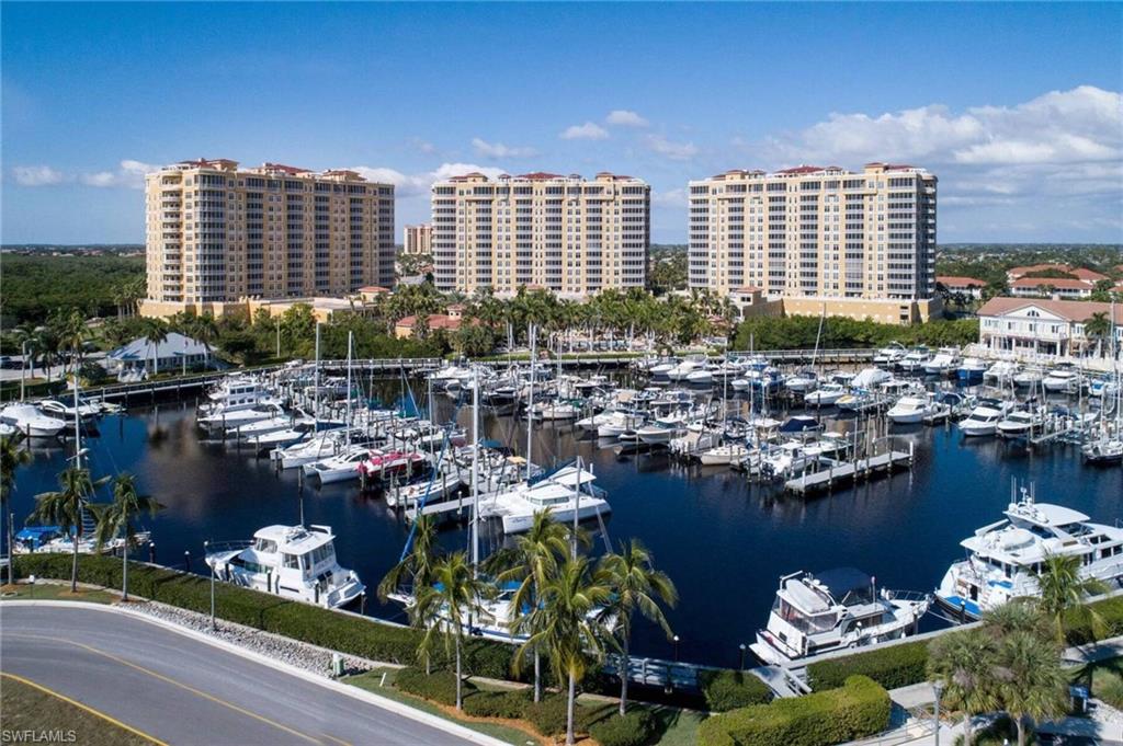 Welcome to Tarpon Point Marina, SW Florida's premier resort community! This 6th floor condo is being offered "Turnkey Furnished" to make your move a breeze. The private elevator leads you directly to your unit, so there are no hallways to share with adjoining neighbors. Enter through the double door entry and you'll be awed by the fantastic views of the Marina and River. This condo boasts over and over 3200 sq ft of indoor & outdoor living, with balconies on both the front and rear of the building. The floor plan is spacious, with an open great room concept that exemplifies casual Florida living. Three Large Bedroom Suites plus a Den/4th Bedroom, Formal & Casual Dining Areas, and a Chef's Kitchen for the cook in the family. There is a private 2-Car Garage on the 2nd Level of Parking. Whole unit water filtration system, A/C & W/H 2017. This is a PET FRIENDLY association! The 5-star amenities include a tropical area Pool with zero entry, Spa, BBQ Grills, Social Room, Pool Table & Fitness. The community offers 2 more Pools, Tennis, Sauna & more. For those looking for a Lifestyle, your search is over!