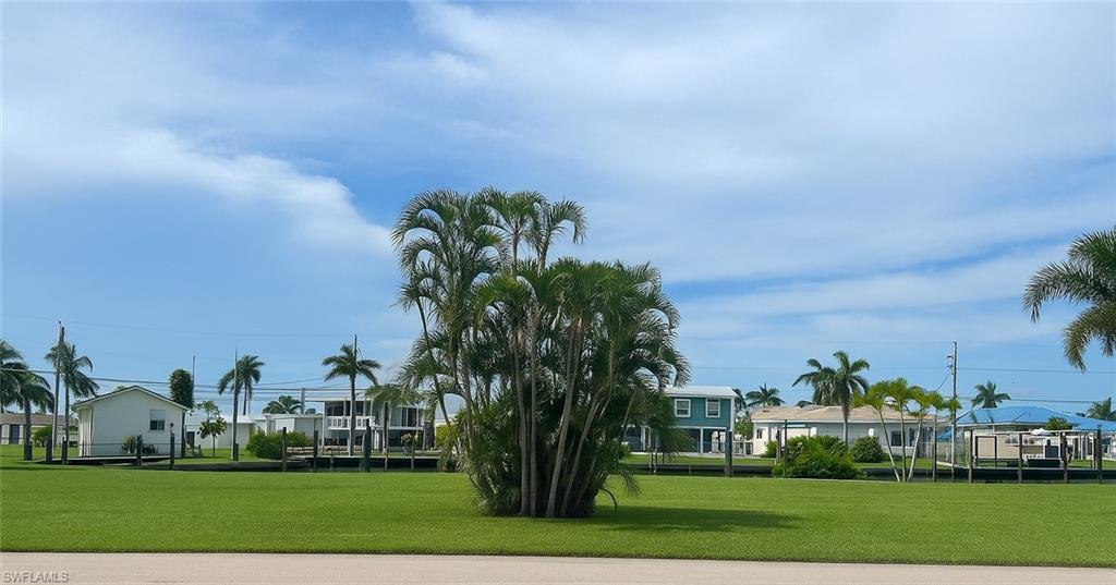 Vacant lot ready for your dream island home. Located on a wide canal with direct access to Pine Island Sound, offering some of the best fishing and boating in Southwest Florida. Enjoy the relaxed island lifestyle with nearby waterfront dining, local shops, and scenic waterways—all just minutes away.