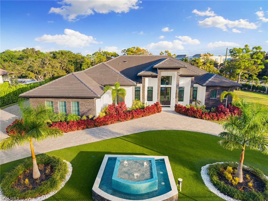 2024-BUILT LUXURY ESTATE ON 1.12 ACRES IN NAPLES’ HIGHLY COVETED PINE RIDGE!