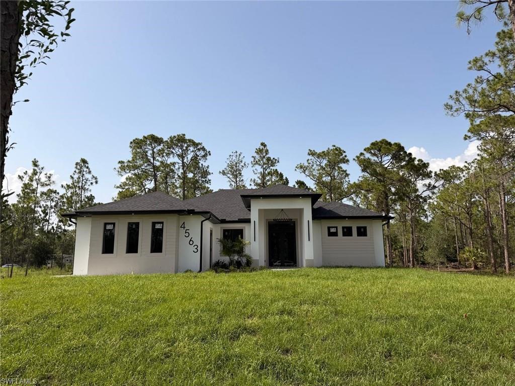 NEW CONSTRUCTION 2026 IN 2.5 ACRES. 4 BEDROOMS AND THREE BATHS,2052 SQF UNDER AC, AND 3,055 SQFT TOTAL AREA.ALL TILE FLOOR, KITCHEN WOOD CABINETS AND QUARTZ COUNTERTOPS AND FULL BACKSPLASH, SHOWER GLASS DOOR IN MASTER AND GUEST BATHROOMS, STANLEY STEEL APPLIANCES, WASHER AND DRYER, CEILING FANS IN ALL ROOMS AND PENDANT LIGHTS, AUTOMATIC SPRINKLER SYSTEM AROUND THE HOUSE, VERY GOOD FINISH AND BEAUTIFUL DETAILS. THIS COULD BE YOUR DREAM HOUSE!
