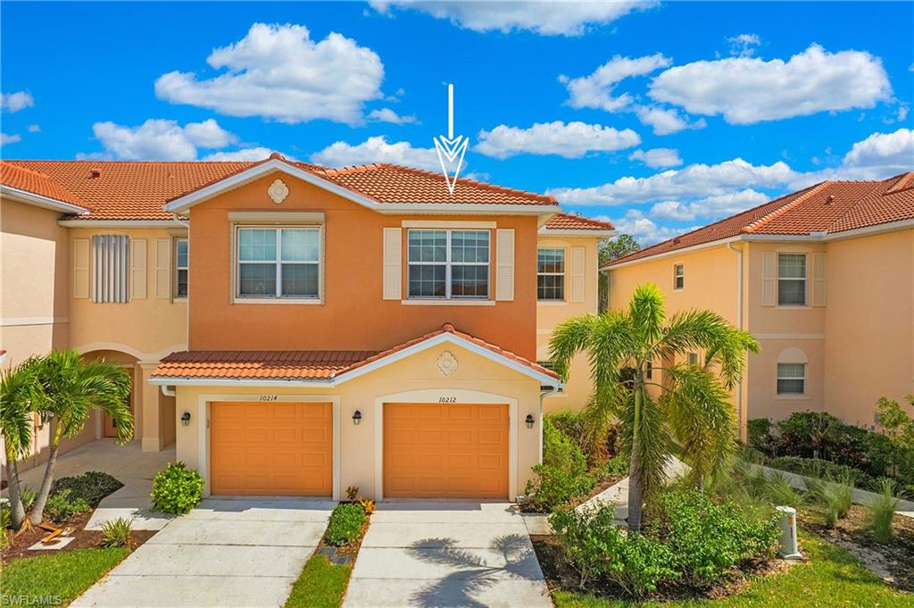Welcome to this lovely two story END-unit townhome located in the vibrant community of Marbella on Cypress! This pristine 3 bedroom, 2.5 bathroom home built in 2018 features an open floor plan and gourmet kitchen, perfect for entertaining. The premium lot features eastern exposure and wide views of the LAKE and Six-Mile Cypress Slough Preserve. The attached 1-car garage offers convenience and ample storage space. Elegant details abound such as crown molding, large windows, and diagonal floor tile throughout the main living space. The second floor offers a split floor plan with the main bedroom suite and two guest bedrooms separated by the hallway laundry room. In the main bedroom you will find his-and-hers walk-in closets with custom built-in closet organizers, a spacious ensuite bathroom with dual sinks and luxurious walk-in shower. The guest suites share a large bathroom replete with soaking tub. Marbella on Cypress is a gated pet-friendly community with outstanding amenities, a resort style pool, LOW HOA FEES, and no CDD. With a location near excellent shopping and dining options, SWFL International airport, and the Fort Myers River District, this home is not to be missed!