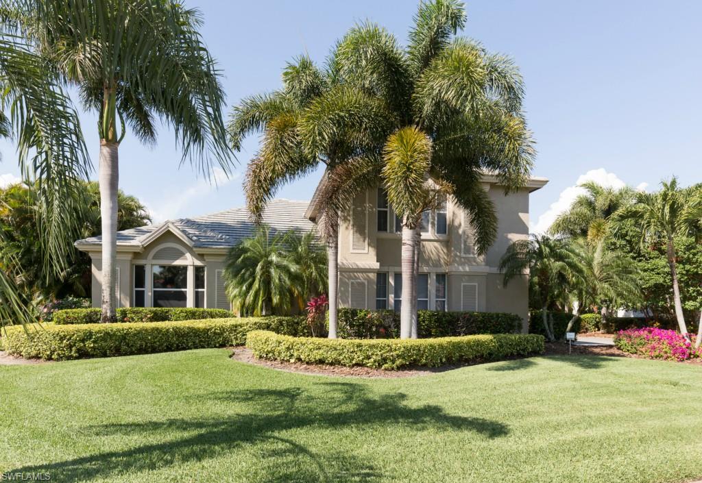 Spacious Edgewater Estates home perfect for the large family visits, 5 bedrooms offer 3 Suites with private baths one that is a second floor apartment, Kitchen features wood cabinetry, Granite Counters, Stainless Appliances, Center Island, Desk and Walk-in Pantry, Big Saltwater Pool and Spa with Paverstone decking, Outdoor Kitchen and great Golf Course Views, Big Formal Dining and Living room with Vaulted Ceilings, Master Suite also has Vaulted Ceilings and huge Private Bath, 2 Walk-in Closets and Separate Vanity areas,  Diagonal Tile, Arched Doorways, Crown Molding,  3 Newer AC units and High Tech Security System, 3 Car Garage, Paverstone driveway and Screened front door Entrance. Lanai furniture negotiable. Sports membership included, buyer to pay transfer fee. 186 slip deep water Marina with slips available for lease or purchase.  Some amenities herein available but not offered. Living area sq. ft. per developer floor plan.