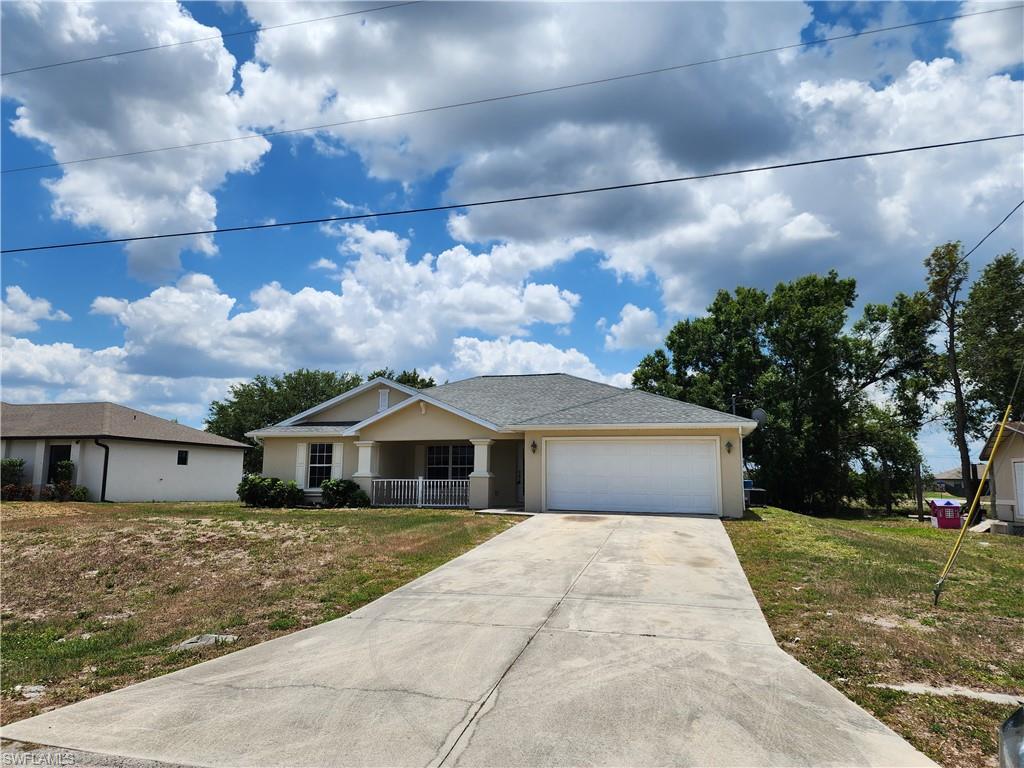 Almost brand new!!!!! 3 bedroom 2 bath 2 car garage home close to ft myers and shopping. Home has a brand new roof with 20 yr warranty.  New tile. cabinets. granite, plumbing, screens, fans, lights and even door knobs!!! Almost everything was replaced. Home has impact windows in case of a storm. Bring the kids perfect home for your family schedule your showing today!!