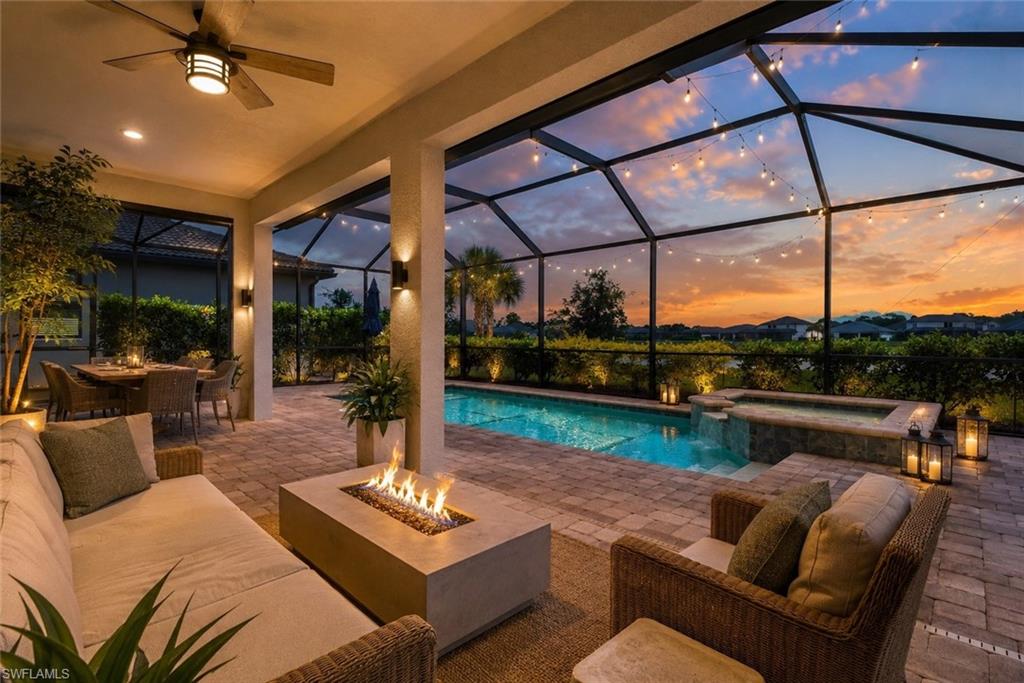 NO FLOOD ZONE, NO CDD. This beautifully maintained, single-owner Pulte Citrus Grove home reflects a level of care that's immediately apparent the moment you walk through the door. Since purchasing the home in 2021, the owners have invested in thoughtful upgrades throughout while maintaining every major system with routine professional service. The result is a home that not only looks exceptional but has been meticulously cared for inside and out.
Inside, you'll immediately notice the attention to detail, from elegant tray ceilings in the living room, office, and primary suite to upgraded tile flooring throughout the main living areas. The flexible office with French doors provides the perfect work-from-home space, while the spacious living room features a custom built-in entertainment center with a remote-controlled electric fireplace, creating a warm and inviting gathering space.
The kitchen was designed with both beauty and convenience in mind, featuring upgraded cabinetry with crown molding, quartz countertops, a tile backsplash, Blanco Silgranit sink, Wi-Fi touch faucet, reverse osmosis water system, built-in pantry organization, and a full suite of black stainless Wi-Fi-enabled appliances, including a smart refrigerator with built-in Alexa. Just off the kitchen, the custom beverage bar with app-controlled lighting adds the perfect finishing touch for entertaining.
The primary suite offers a true retreat with a tray ceiling, custom closet system, and an upgraded spa-inspired bathroom featuring a frameless glass shower with floor-to-ceiling tile. Even the laundry room has been thoughtfully upgraded with custom cabinetry, butcher block countertops, and a brand-new Wi-Fi-enabled LG washer and dryer.
Step outside to your private backyard oasis featuring an extended covered lanai, screened pool and spa with heater, and plenty of space to relax or entertain year-round. Additional upgrades include an extended driveway, EV charging outlet, outdoor generator hookup with transfer switch, Wi-Fi-enabled garage door, smart front door lock, comprehensive Ring security system, and professionally maintained pool, HVAC, water treatment, and pest prevention services. For added confidence, the home also includes the remaining balance of the 10-year Pulte structural warranty. From the extensive list of smart-home features to the exceptional level of maintenance throughout, this move-in ready home offers an outstanding opportunity to enjoy comfortable Florida living in a welcoming, family-friendly gated community—all just minutes from shopping, dining, schools, and everything Fort Myers has to offer.