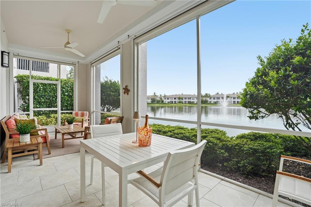 West is best, and exactly what awaits inside this elegant 2 Bed + Den; 2.5 Bath end unit coach home in the highly coveted Signature Club at Lely Resort featuring membership to The Players Club & Spa! Immerse yourself in quintessential Naples living on the large lanai, with sparkling westward lake views and irresistible SWFL sunsets! Inside, you are greeted with luxury finishes and an open concept layout for easy living. The gourmet chef's kitchen includes: gas range, GE Profile appliances, quartz countertops, and custom cabinetry and lighting. The main living area is perfect for entertaining, complete with a wet bar and beverage/wine fridge. The open floor plan allows natural light to flow into the unit while breathtaking waterfront views are visible from nearly every room! The spacious primary suite offers dual custom walk-in closets and a spa-inspired bath with soaking tub and large walk-in shower. The thoughtfully designed split floor plan places the spacious den, guest bedroom, and en-suite guest bath on the opposite side of the home, providing guests with exceptional privacy and their own comfortable living space. Let's talk peace of mind: this 2017 Stock Development home comes equipped with impact-resistant windows and doors, Storm Smart Kevlar Electric Storm Shutters, and smart thermostat. Just steps away from the famous Players Club & Spa, Signature Club is the only community within Lely to have a private pedestrian gate allowing residents to enter The Players Club without ever leaving the community! As a member of The Players Club you will enjoy resort-style and lap pools, a full-service spa, a 3,600 sqft. fitness center with extensive classes, indoor and outdoor dining venues/restaurant, tennis, pickleball, and bocce courts, along with a vibrant year-round calendar of social events, clubs, entertainment, and activities. Opportunities like this are rare—schedule your private showing today and discover why this is one of Lely Resort's most desirable addresses.