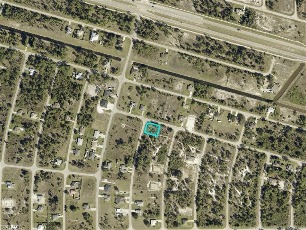 Build your new home on this 0.28-acre corner lot located in the growing Lehigh Acres area of Fort Myers. This mostly cleared parcel offers paved road access and is surrounded by a mix of newer and established homes. Conveniently located just minutes from SR-82, providing easy access to shopping, dining, schools, Southwest Florida International Airport, and other area amenities. No HOA.