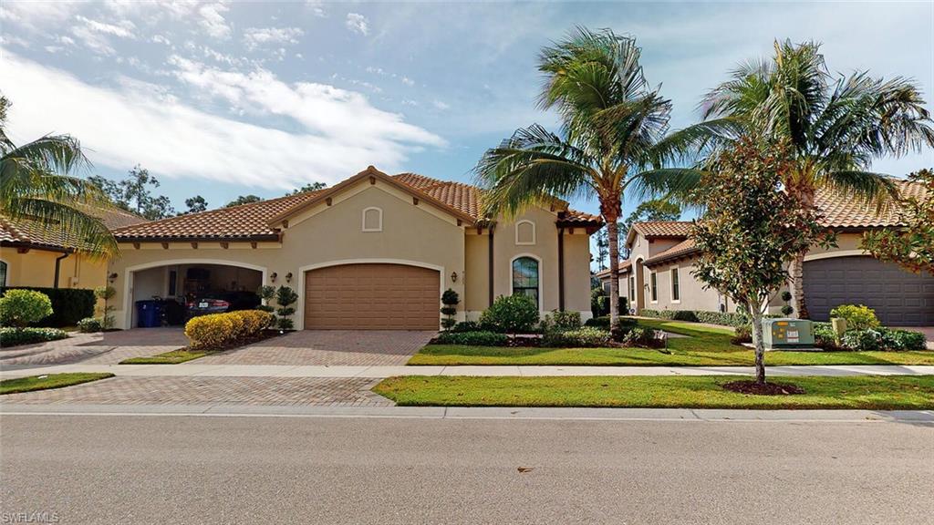 Beautiful 2+den, 2 bath Villa in the heart of Bonita Springs! Located very close to US 41, but far enough away to escape the hustle and bustle of daily traffic. So close to everything you want! Coconut Pointe Mall, shopping, dining, golf, activities and just minutes to the beaches. The community amenities are fantastic and feature community clubhouse and pool, covered bbq/picnic area, community park, exercise room, pickleball, tennis court and play area for the little ones. 2 car garage, large screened lanai with calming, preserve landscaped view. Stunning large kitchen that's beautifully equipped with an amazing amount of storage and a generous island that is also a breakfast bar. Open floor plan with high tray ceilings create a perfect flow to the main living space. Impact windows and doors means NO storm shutters to worry about. Lawn care is included in the low monthly fee and there is no CDD! Enjoy a short walk to pubs, restaurants & movie theater! You are home!