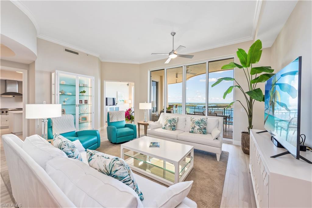 Spectacular views of the Gulf of Mexico and Ten Thousand Islands abound from this stunning 3 bedroom, 3 and a half bath residence located within prestigious Cape Marco. Upon entering the residence from the private elevator foyer, you will immediately be captivated by the gorgeous, coastal interior and exceptional views. Enjoy 11' ceilings unique to only a few of the top floors, wood-look tile flooring throughout the main living area, ample natural light, and the most luxurious finishes throughout. The kitchen will delight any chef with beautiful cabinetry, quartz counters, gas cooktop, center island, and breakfast bar. The master suite is a private retreat complete with lanai access, beautiful views, 2 walk-in closets, and spacious en-suite bath that exudes a spa-like feel. The large front balcony is the ideal space to relax and enjoy the picturesque views. The back lanai provides a private space for guests to take in views of the Gulf and Island. Enjoy all of the upscale amenities available at gated Cape Marco including 6 HarTru tennis courts and private beach access in addition to the many amenities Belize offers - fitness center, theater, guest suites, and more.