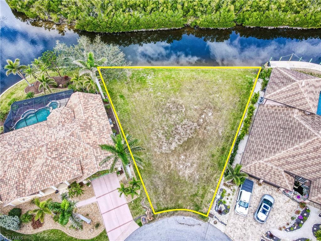 BUILD YOUR DREAM HOME and live the Florida Lifestyle!! SAILBOAT water access to Charlotte Harbor with this OVERSIZED WATERFRONT LOT with 140 feet of water frontage on a cul-de-sac in the highly desired Burnt Store Isles Community. NO HOA FEES!! Need a builder? Let us introduce you to reputable local builders! Burnt Store Isles is an optional HOA, deed-restricted, waterfront, and golfing community with Twin Isles Country Club situated in the center of the community. You can also enjoy all the amenities that Punta Gorda has to offer such as biking, fishing, boating, dining, live entertainment, and much more!