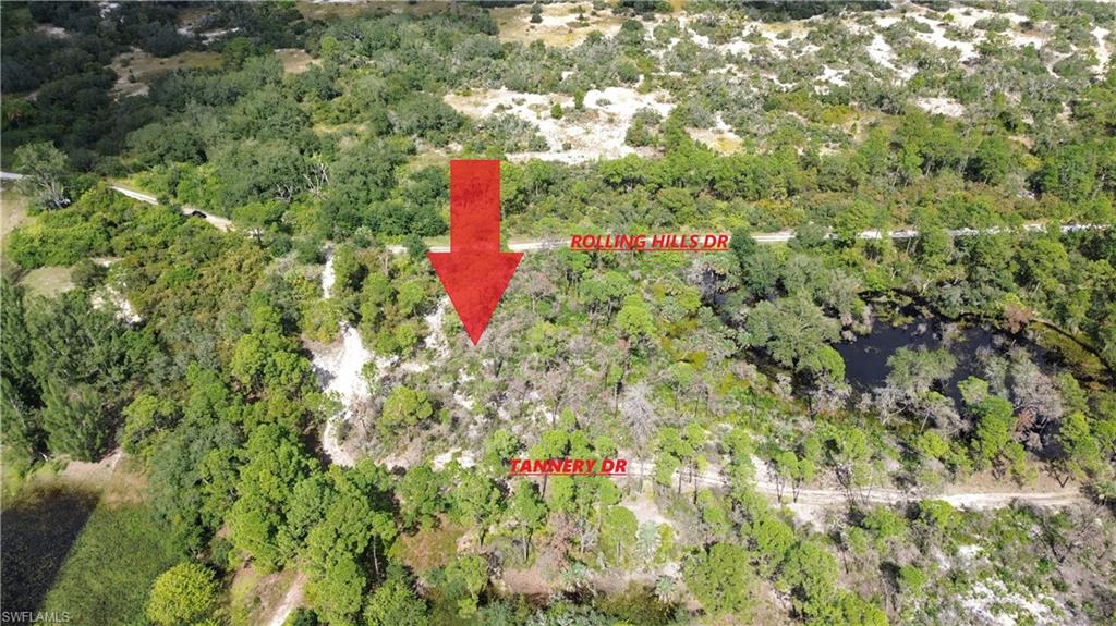Double lot/ Larger irregular shaped corner parcel for sale in Sun N Lakes Lake Placid. 0.60 of an acre, this oversized lot extends from Rolling Hills Dr to Tannery Dr. Area is not as developed so take advantage of low prices, one of the few places left in South Mid Florida. Close to the city of Lake Placid and Sebring. Will need septic and well. Parcel is in the unincorporated area of Highlands County, as such it is governed by Highlands County. Road Maintenance, code enforcement, public safety services are provided by Highlands County.