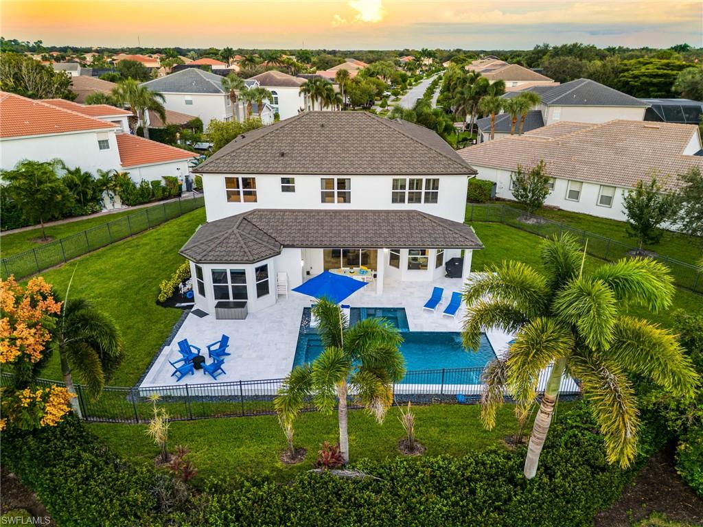 Located within the prestigious gated community of Saturnia Lakes, this exceptional Sapphire Model 4 + Den, 3.5-bath home sits on one of the

largest pie-shaped lots, offering a limited edition serene (SUNSET —western exposure) preserve view and a fully fenced yard—perfect for families and pets. This two-level residence features cathedral ceilings, custom built-ins, and an open floor plan ideal for entertaining. Upgrades abound: 2024 new roof, 3-pane impact-tinted windows, new impact garage door, motorized remote shades, and a 5-year-old heated saltwater pool and spa. AC, pool, and garage door are all smart-device controlled. The gourmet kitchen includes stainless steel appliances, a large pantry, and breakfast area. The spacious first floor primary suite and guest rooms include walk-in closets, and the den offers flexibility for a home office or creative space or even a 5th bedroom.

Enjoy resort-style living with a clubhouse featuring a state-of-the-art fitness center, lake-view pool, lap pool, spa, sauna, tennis courts/pickleball, basketball, billiards, and more.
A true must-see!