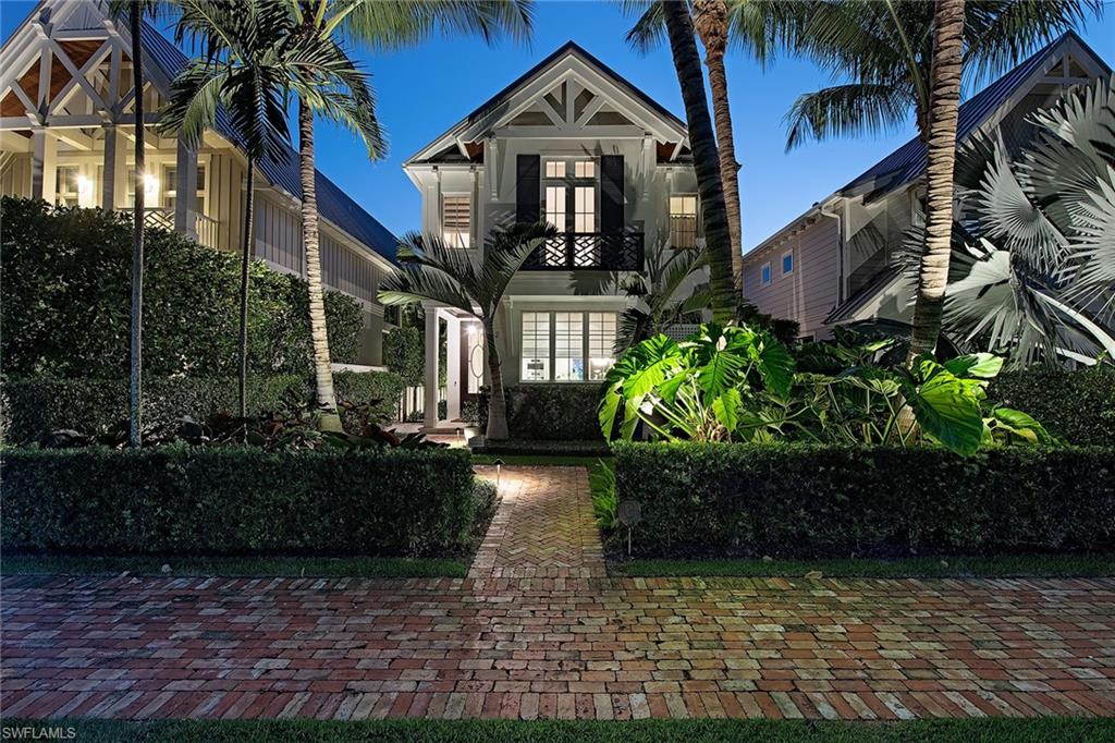 The good life awaits, in the heart of Old Naples. Stunningly beautiful. Built in 2013, completely reimagined in 2019. Exquisitely appointed. All new interior finish & design. Flowing floor plan. Featuring 3 bedrooms, 3.5 baths, attached 2-car garage with gated entry. Light & bright. Very private pool with flaming bowls & waterfalls. Amazing indoor-outdoor patio room brings nature in.  Spacious Grand master with luxurious master bath,  two additional guest beds en-suite. Chef’s kitchen will delight, with Miele appliances, steam oven, and oversized island for entertaining. Expansive picture-perfect great room combining dining and gathering space. Every detail considered. Every desire met. No expense spared. Stroll a few blocks to beach, dining or shopping. See it today - Live it tomorrow!