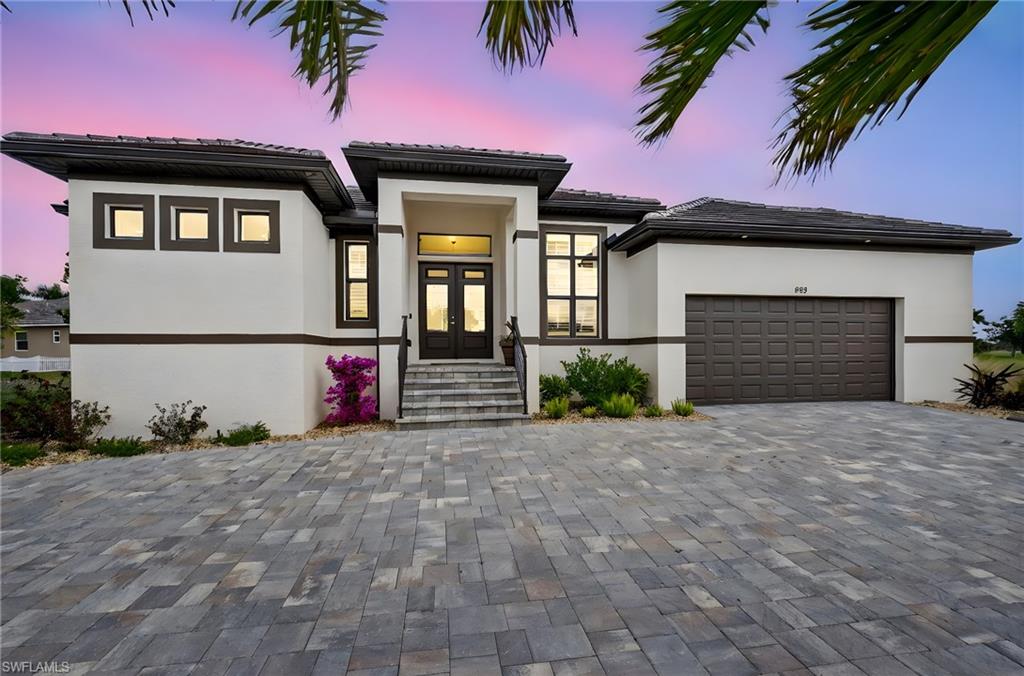 STUNNING NEW GOLF-LAKE CUSTOM BUILT ESTATE HOME! Million Dollar LAKE & FAIRWAY VIEWS. OVER $350,000 IN BUILDER/OWNER UPGRADES IN THIS 3 BEDROOM, DEN, 3 BATH, POOL, 2.5 car garage with epoxy flooring treatment, extensive additional overhead storage, extra wide 18 foot garage door and private side door entrance, HOME MUST BE SEEN. The home has unmatched height for this subdivision, the main floor level  is (11.38 feet above sea level). Pool is salt water with up fall waterfalls, 2 high power therapy jets and color options for the night light in the pool.Big OPEN FLOOR PLAN, all "wood plank" ceramic tile floors thru the whole house for ease of maintenance.. All 12' coffer-ed and crown molding accented throughout the whole home. "CHEFS" kitchen WITH WHITE "SHAKER" WOOD CABINETS, LEVEL 5 GRANITE TOPS, HIGH END STAINLESS STEEL APPLIANCES, Large walk in “butler’s pantry” with granite tops and extensive cabinets., TILE BACK-SPLASH & 12' CENTER-ISLAND WORK STATION AND FAMILY GATHERING SPOT WITH 4 STOOL SEATING CAPACITY. All windows & sliders are "IMPACT" STORM RESISTANT for total buyer comfort. Kevlar screen controlled by remote control, for the Lanai. Lots of glass windows and high sliders makes the home LIGHT-BRIGHT & SUNNY all year round. MASTER BEDROOM, has "His & hers" walk-in closets both with custom organizers, dual granite top vanities and an incredible huge TILE GLASS WALK-THRU SHOWER, Master shower is 9 feet in length and has a large sitting bench.. BEAUTIFUL PAVER LANAI AND POOL DECK WITH "PICTURE GLASS" WINDOW SCREEN CAGE, for unobstructed views of the fairway and lake and a great SUMMER KITCHEN for all the family poolside entertaining. Additionally, there is a custom "SAND BOX" for the children and another PAVER GOLF VIEWING LANAI OR JUST GREAT SUNSET COCKTAILS. The home was built by Quality Homes of Port Charlotte ( 30 + years building homes in this area). It is a very well constructed home. Home come with a ONE YEAR COMPLETE HOME WARRANTY, for total buyer comfort.