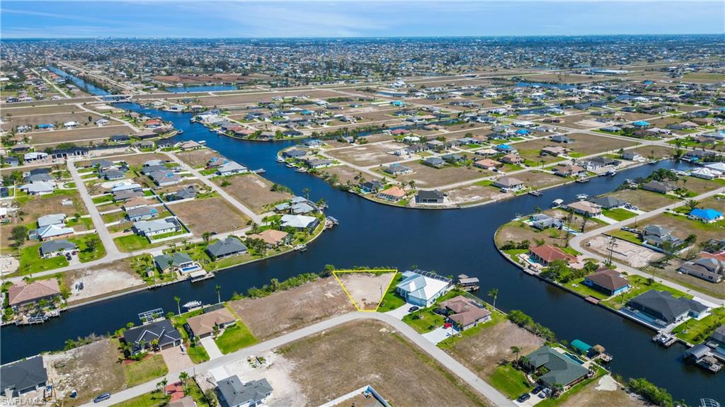 One of the last corner lots left for sale in NW Cape Coral. Gulf Access with only 1 bridge to freedom of enjoying what SWFL pristine Gulf of Mexico as to offer. This lot is ready to be built on and Seller has estimates in hand for seawall and survey. You do not want to miss this opportunity to built along side some amazing $1-$3m dollar homes.