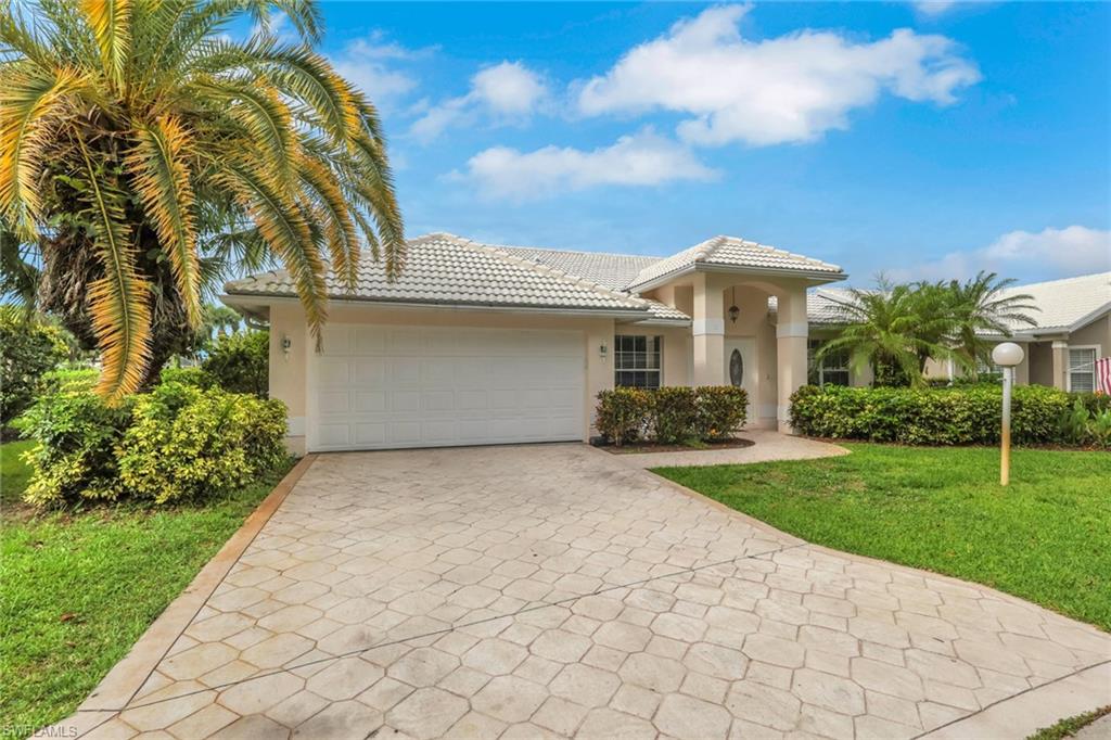 This home is not in a flood zone! Tucked inside The Colony in the heart of Fort Myers, this 3 bed, 2 bath home sits in a prime location. Double doors open directly into a formal dining area and living room with vaulted ceilings and rich wood floors that flow throughout. The open floor plan gives you plenty of space for entertaining and tons of natural light. In the kitchen you'll find stainless steel appliances, granite countertops, a tile backsplash, a center island, and a breakfast bar. Sliders and a large transom window let natural light pour into the family room and lead out to a spacious screened lanai and additional Florida room. The primary bath has dual sinks and a glass-enclosed shower, and there's also in-residence laundry and a large rear yard to enjoy. Low HOA fees cover lawn care, exterior pest control, and the community pool with clubhouse, plus you'll have access to a fitness center and BBQ grill area. Outside the neighborhood, you're right at the crossroads of Daniels Parkway and 6 Mile Cypress Parkway, with shopping, dining, and healthcare just minutes from your door. I-75 and RSW Airport are a quick drive away, and several Spring Training baseball stadiums.