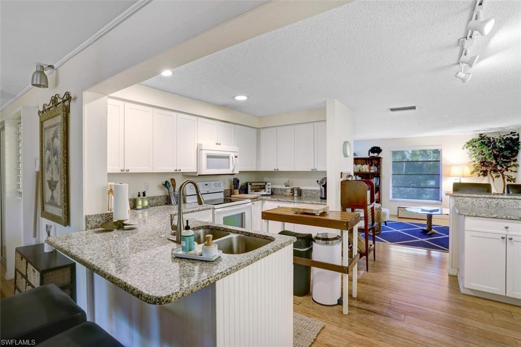 Awesome Sanibel near beach opportunity awaits with this comfortable 2 BR/2 BA ground level beach cottage located close to world renowned Bowman's Beach. Situated on a large 1/2 acre lot. The home features an updated kitchen, bamboo flooring, solid CBS construction, new AC (2019), total repipe (2019), expanded living room, mudroom/laundry room (that could easily be converted into a 3rd BR), screened lanai, storm shutters, and a huge fenced backyard for your furry friends. If you are looking for a quality Sanibel getaway with lots of value and a very short bike ride to a beautiful beach, then this is your place.