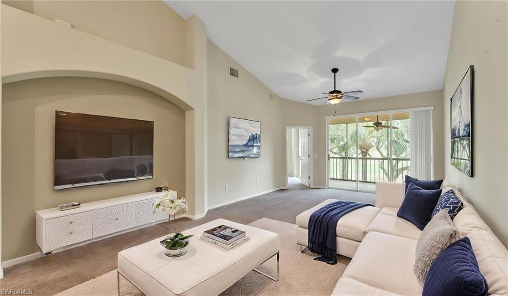 This beautifully maintained second-floor residence showcases soaring cathedral ceilings and sweeping views of the front nine at Grasslands Golf & Country Club. Featuring two bedrooms plus a fully enclosed office/den — easily utilized as a third bedroom — this home is located within The Enclave, a gated community inside the highly regarded Grasslands neighborhood. Optional membership opportunities are available through the country club, offering access to championship golf, a fitness center, tennis courts, a resort-style pool, social and children’s events, and both formal and casual dining venues. A covered parking space is included, along with ample guest parking conveniently situated by your designated space. Recent updates include fresh interior paint, new carpet, and a beautifully renovated kitchen — making this home truly move-in ready!