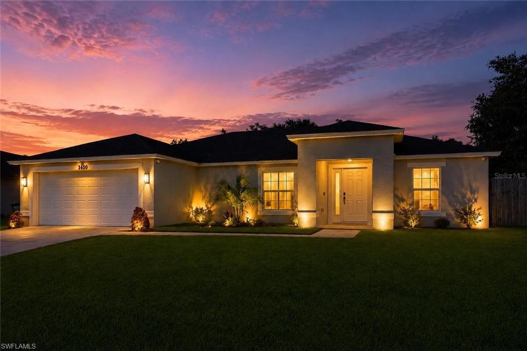 Built in 2020, this well-maintained home offers 3 bedrooms, 2 bathrooms, plus a versatile flex room that can easily serve as a home office, guest space, or potential 4th bedroom. Situated on nearly a quarter-acre lot, the property provides plenty of outdoor space with mature pine trees creating a peaceful backyard setting. A double-gate side entrance offers convenient access for boats, trailers, or other recreational vehicles, while the expansive 20x12 screened lanai creates the perfect space for relaxing or entertaining year-round. Inside, the open-concept layout provides a seamless flow between living spaces with endless possibilities for furniture arrangement and everyday living. The split-bedroom floor plan offers privacy, while the spacious primary suite features dual vanities, a soaking tub, separate shower, and a large walk-in closet. Additional features include an indoor laundry room, modern construction, and a functional layout designed for comfortable living.