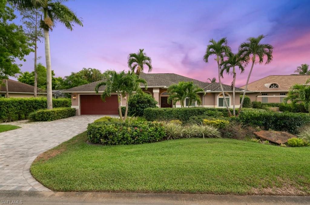 Fantastic opportunity to own a truly move-in ready, 2800 square foot home in highly desirable Queens Park. Set on a beautiful lake and private cul-de-sac street with southwestern rear exposure, the current owner has updated and maintained this beautiful residence. Highlights to this home include new AC, impact resistant windows, saltwater pool, pool heater, new tile around pool, full house generator, plantation shutters, oversized garage, electric shutters, and block paver driveway. Soaring ceilings and lake views welcome guests as they enter the home. The dedicated dining room and formal living room are perfect for entertaining guests and family. A large kitchen overlooking the family room is the centerpiece of this home, and includes coveted extra cabinet space, a large pantry, granite countertops, and SS appliances. Spacious master bedroom and bathroom, two large guest bedrooms and a study/den round out the other rooms. Pool has recently been resurfaced and the covered lanai is expansive for enjoying nightly sunsets. The .27 acre lot includes lush landscaping, privacy, and an array of fruit trees- lemon, lime, banana, avocado, mango. Queens Park is 4 miles to 5th Ave and beaches