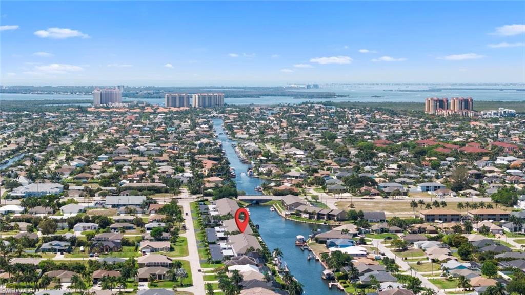 Welcome to waterfront living at its finest! This beautifully maintained first-floor condo at 4622 SW 12th Place, Unit 124 offers the perfect blend of comfort, convenience, and Southwest Florida lifestyle. Featuring 3 spacious bedrooms, 2 baths, and over 1,650 square feet of living space, this canal-front residence provides direct Gulf access with only a 40-minute boat ride to open water. Enjoy relaxing cruises to nearby favorites including Cape Coral Harbor and the Westin, both offering exceptional casual and fine dining just minutes away by boat.
Inside, the home boasts an open and inviting layout with tile flooring throughout the main living areas and plush carpeting in the bedrooms. The oversized primary suite features private lanai access, a large walk-in closet, and plenty of natural light. Double sliding glass doors in the living room open seamlessly to the screened lanai, creating the perfect indoor-outdoor Florida lifestyle. Plantation shutters accent the kitchen and guest bedrooms, while the lanai storage closet provides convenient additional shelving and storage space.
Some furniture is also negotiable, making this an excellent opportunity for buyers seeking a move-in ready Florida retreat.
This condo has seen major upgrades including a new dock after Hurricane Irma, a new carport after Hurricane Ian, and a new roof, offering peace of mind for years to come. Residents enjoy a beautifully maintained community pool and hot tub with sunny western exposure—perfect for enjoying breathtaking sunsets.

The monthly association fee of $585 includes insurance, irrigation water, grounds maintenance, exterior pest control, sewer, street lighting, trash removal, and water, making for truly carefree living.

Whether you’re looking for a year-round residence, seasonal retreat, or waterfront investment, this exceptional Gulf-access condo delivers the very best of the Florida boating lifestyle.