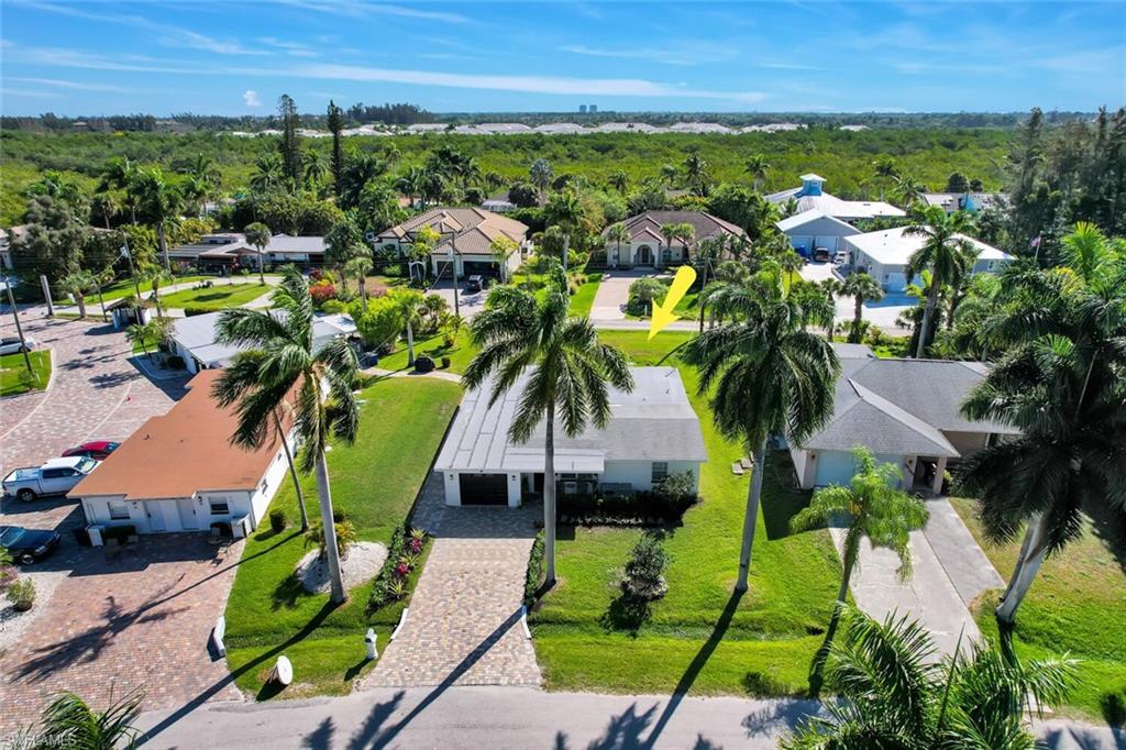 Conveniently located off McGregor BLVD, this fabulous and meticulously maintained renovated non-conforming triplex home is perfect to have as an investment and for yourself as well! This property has the potential to generate fabulous passive income as a non-conforming, fully rented triplex. Location location, location, has never rained more true than with this property as it is a stone's throw away from Fort Myers Beach, the bridges to Cape Coral, and 10-minute drive to I-75.  The first unit, with 2 beds and 2 full baths, boasts a large living and kitchen area perfect to keep for yourself. The second unit, a 1 bed/bath is updated with a peninsular spillover kitchen island. The third and last unit is a cozy efficiency/studio. Prospective tenants will be sure to love the updated driveway and curb appeal of the building.