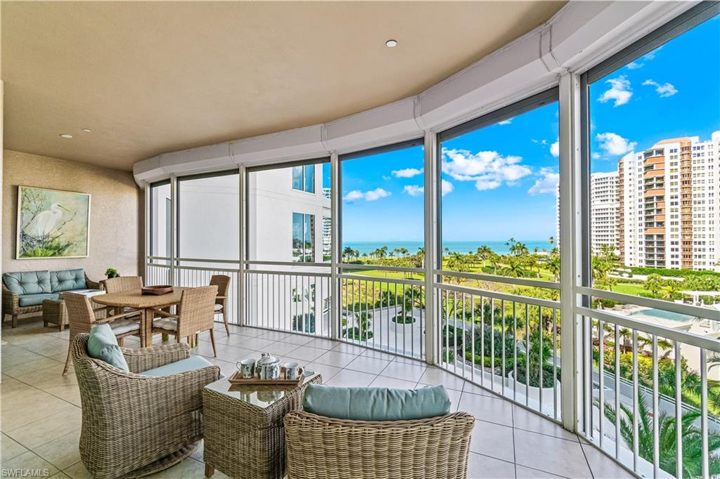 Experience unparalleled beachfront luxury living in this exquisitely updated, 6th-floor residence at the esteemed Provence. Boasting three bedrooms plus a den and three bathrooms, this meticulously redesigned unit offers a lifestyle of sophistication and comfort. Step inside to discover a masterful redesign featuring high-end custom finishes and a thoughtfully curated floor plan that maximizes every inch of the living space. From the moment you enter, breathtaking vistas greet you from every room, showcasing stunning views of the Gulf, bay, and city skyline. This highly desirable 05 stack residence spans over 3,300 square feet of impeccable living space, meticulously appointed with luxurious details throughout. The living room seamlessly transitions into the dining area, creating an ideal space for entertaining. The expansive gourmet kitchen, complete with a center island, flows into the family room area, perfect for gathering with loved ones.
Outside, the living space extends to multiple seating areas, providing the ultimate setting for enjoying Naples' beautiful weather and picturesque views. The primary en-suite is a sanctuary of relaxation, featuring a separate seating area, his and hers walk-in closets, dual sinks, and a separate tub and shower. Additional features include impact glass and electric hurricane shutters, two deeded parking spaces, and extra storage, ensuring convenience and peace of mind for residents. This residence is being sold furnished and ready for immediate enjoyment and relaxation. Provence offers resort-style amenities, including a welcoming lobby, state-of-the-art fitness center, resort-style pool and spa, guest suites, and 24-hour security.  Provence is a pet friendly building, allowing its residents to have 2 domestic pets. Conveniently located steps away from Venetian Village, residents have easy access to upscale dining, shopping, and entertainment options in Naples. Owners at Provence have the option to lease or purchase a boat slip at the Venetian Yacht Club, adding to the allure of waterfront living in this prestigious community. Don't miss the opportunity to indulge in the epitome of coastal luxury living at Provence.
