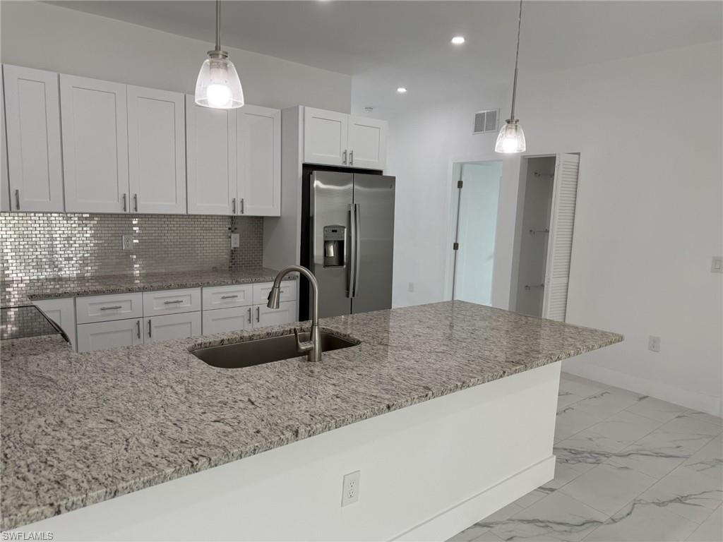 TWO BRAND NEW DUPLEXES , side -by- side, and a third one in the same area, ready to move in, available to sale separate  or together as a package! Convenient Located in SW area of Lehigh Estates, quick access to SR 82, Colonial/Lee Blvd, shopping centers, banks, restaurants, golf course, Fort Myers International Airport and beautiful Beaches. New Construction, Custom Designed Duplex. Each unit feature 3 bedrooms, 2 bathrooms, large living area, indoor laundry, covered lanai and 1 car garage. Great open concept kitchen with white shaker style cabinets with eat in-island or breakfast bar, granite countertop and stainless steel appliances, tile throughout, large Driveways. Available NOW! 5249-5251 and 5253-5255 Centennial  and 3969-3971 Sunset Rd. have the same owner and can be sold together as a package.