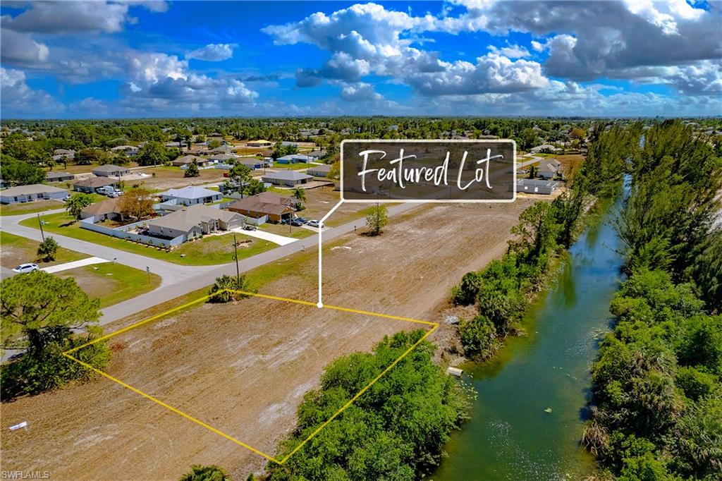 Great property in the fastest growing market of Cape Coral. Views of De Navarra Canal . Fishing, kayaking or boating right from the back yard. Secluded and quiet part of Cape Coral yet very close to shopping, golf course and several boat ramps. Don't have a builder in mind? not a problem, several options available depending on your needs. Make an offer today before its gone!