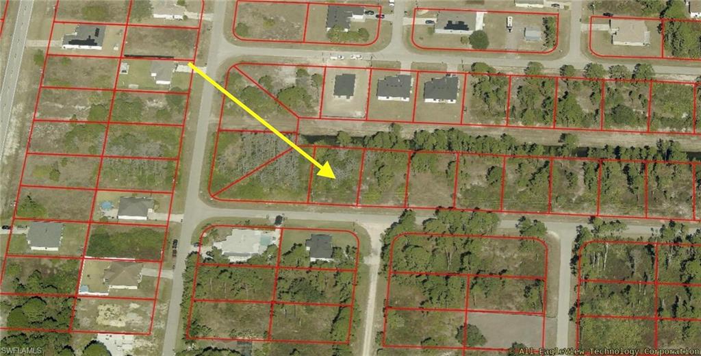 Prime opportunity to build on a waterfront lot in one of the fastest-growing areas of Lehigh Acres. This residential vacant lot backs up to a freshwater canal, offering peaceful water views, added privacy, and the perfect backdrop for your future pool, lanai, or custom outdoor living space. Located in a quiet neighborhood surrounded by newer construction, this property provides easy access to SR-82 for convenient commuting to Fort Myers, RSW International Airport, shopping, dining, and schools. You get the benefit of tranquil canal-front living while staying connected to everything Southwest Florida has to offer. Whether you're a builder planning your next spec home, an investor securing land in a high-growth corridor, or an end-user ready to design a custom waterfront home, this lot delivers flexibility and long-term upside. No HOA. Waterfront lots at this price point are becoming harder to find—secure your piece of Lehigh Acres today.