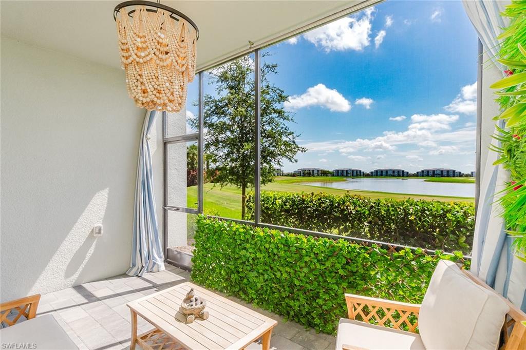 GOLF & LAKE VIEWS • OVERLOOKING HOLE #1 • GOLF MEMBERSHIP INCLUDED • GROUND FLOOR - NO STAIRS • UPGRADED FLOORING
Welcome home to one of the best values in The National Golf & Country Club at Ave Maria, where breathtaking golf and lake views take center stage. Perfectly positioned on a premium homesite overlooking Hole #1 of the Gordon Lewis-designed championship course, this beautifully maintained Bromelia Veranda offers the coveted "trifecta" of scenery—sparkling water, lush fairways, and front-row golf course views that create an unforgettable backdrop to everyday living. Even better, this residence includes a bundled golf membership and is one of the most attractively priced Veranda homes with a garage, making it an exceptional opportunity for both lifestyle and investment.

From the moment you step inside, your eyes are drawn to the spectacular vistas showcased throughout much of the home and from the expansive rear lanai—the perfect place to enjoy your morning coffee as golfers tee off on Hole #1 or unwind with a glass of wine as the sun reflects across the lake.

Designed for comfort and flexibility, this popular floor plan features two spacious bedrooms, two full bathrooms, and a versatile den that easily functions as a home office, guest room, or additional sleeping space. The generous primary suite serves as a private retreat with dual walk-in closets and an en-suite bath featuring double vanities, while the guest bedroom is bright, inviting, and filled with natural light.

At the heart of the home, the open-concept kitchen is designed for effortless entertaining, highlighted by two quartz-topped islands offering abundant prep space, gathering areas, and casual dining options. Luxury vinyl plank flooring in warm coastal tones adds both elegance and durability throughout the living spaces.

Beyond your front door awaits the resort lifestyle that has made The National one of Southwest Florida's most desirable communities. Enjoy world-class amenities including a spectacular resort pool and spa, poolside bar and dining, fitness center, sauna, full-service spa, tennis, pickleball, bocce, and an active social calendar. Just minutes away, the charming Ave Maria town center offers additional shopping, dining, entertainment, and year-round community events.

Adding even more appeal, this property has a proven history of strong seasonal rental performance with repeat bookings and premium income potential. Whether you're searching for a full-time residence, a winter escape, or an investment property, this stunning Veranda delivers the perfect combination of championship golf, sparkling lake views, resort-style amenities, and exceptional value. Opportunities like this don't come along often—come experience why Ave Maria continues to be one of the fastest-growing communities in the country. Ave Maria ~ Once you get here, you "get it."