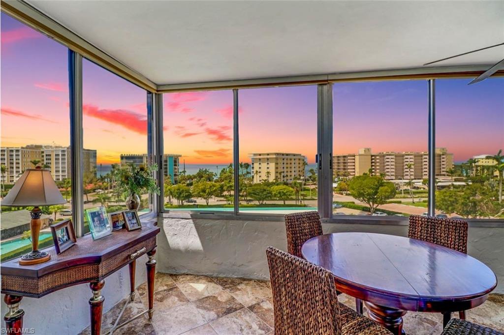 E-Z-2-C!!  Updated and spacious sixth floor bayfront condo with sunset and partial views of the Gulf to the West.  Kitchen and bathrooms have been renovated already!  Stroll the miles of beautiful sandy Moorings and Park Shore beaches on the Gulf of Mexico.  Greet your neighbors in the exercise room or relaxing by the heated pool.  Bike or walk to the nearby Venetian Village for casual lunch or epicurean dinner.  Minutes to shopping, dining and entertainment in Olde Naples, Pelican Bay, Waterside Shops, Artis-Naples and Mercato.  Light and bright end unit with a glass enclosed lanai make this one you'll want to see first!  Ask about boat dock leasing! Call now to schedule a private showing!!